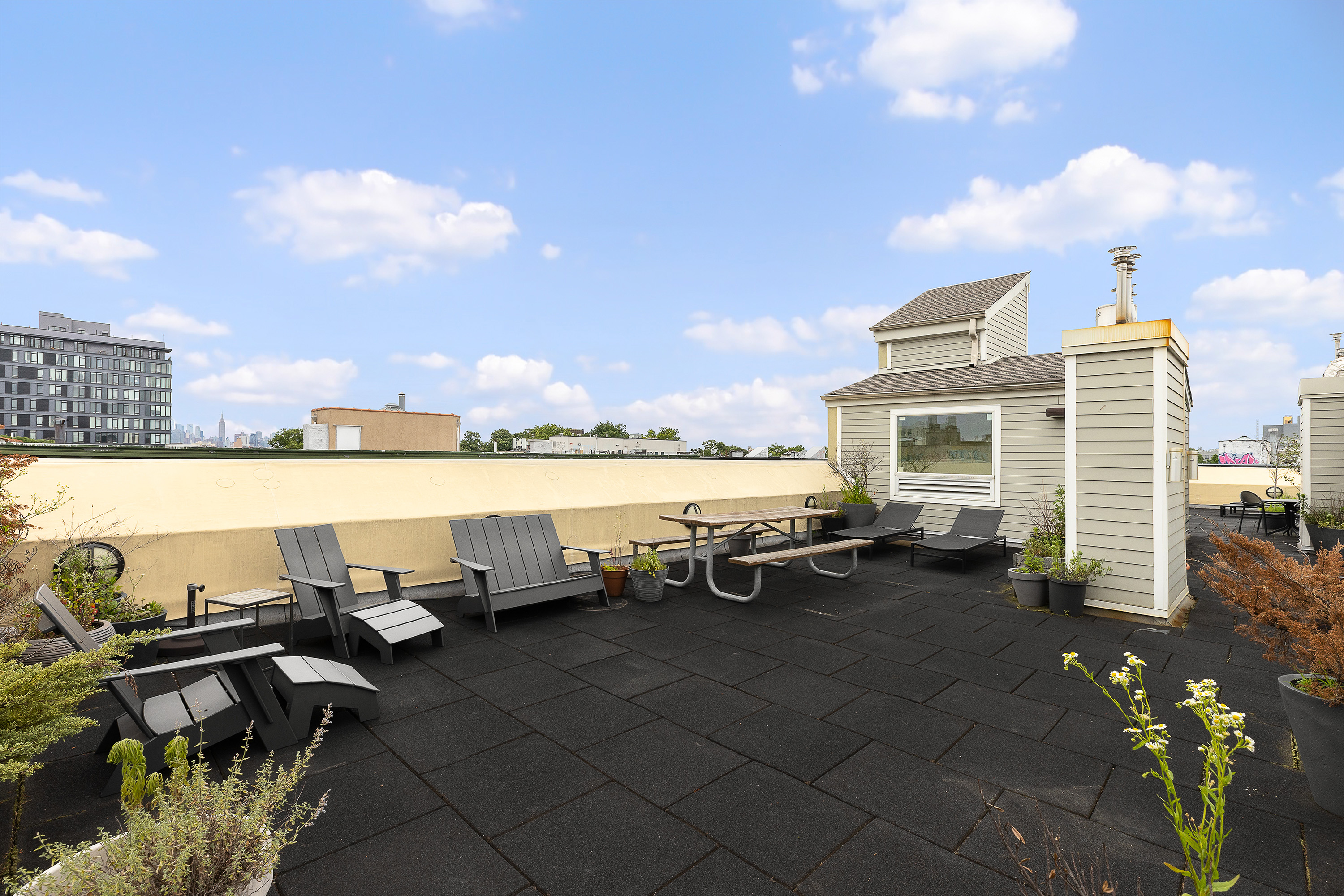 318 Knickerbocker Avenue, Unit 3D Brooklyn, NY 11237 - Photo 6 of 14 a terrace with outdoor seating
