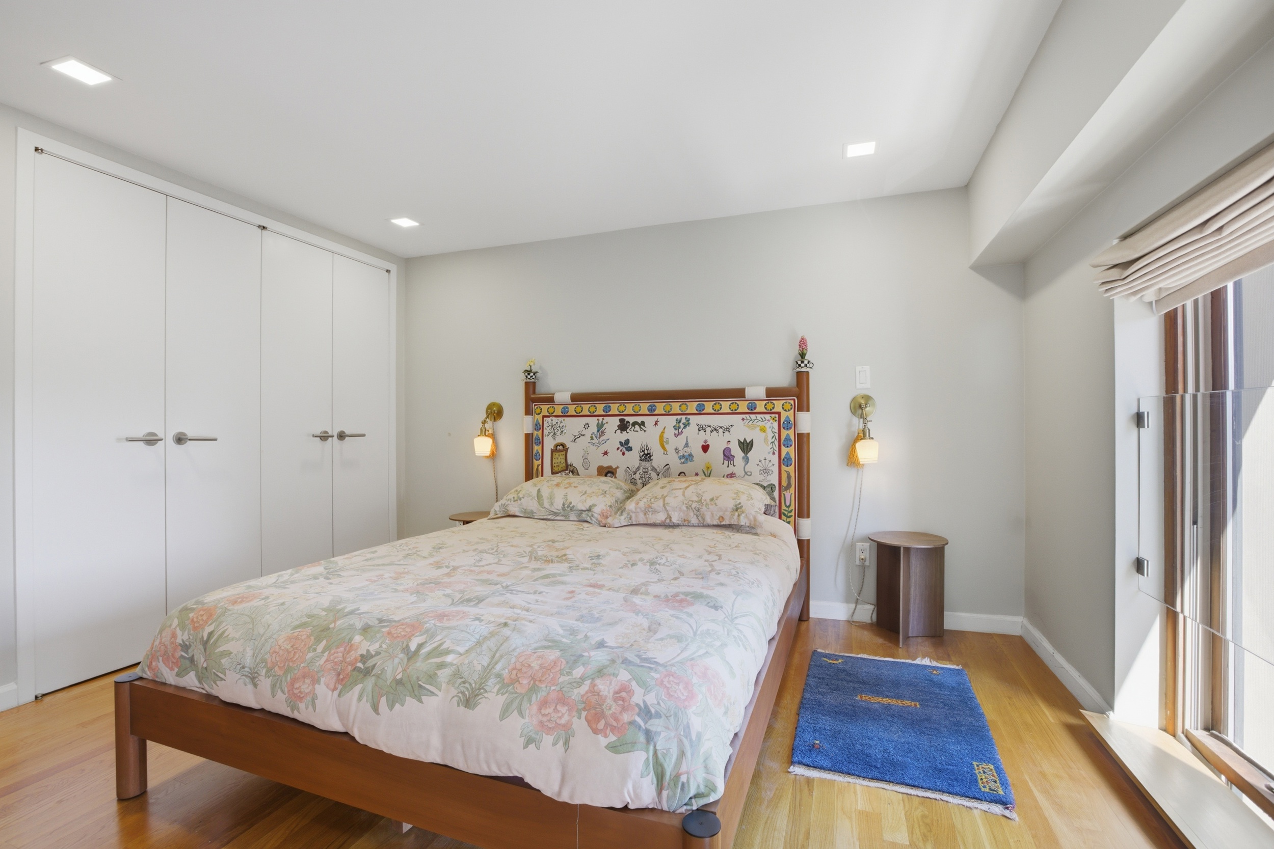 305 2nd Avenue, Unit 521 Manhattan, NY 10003 - Photo 9 of 20 a bedroom with a bed and wooden floor
