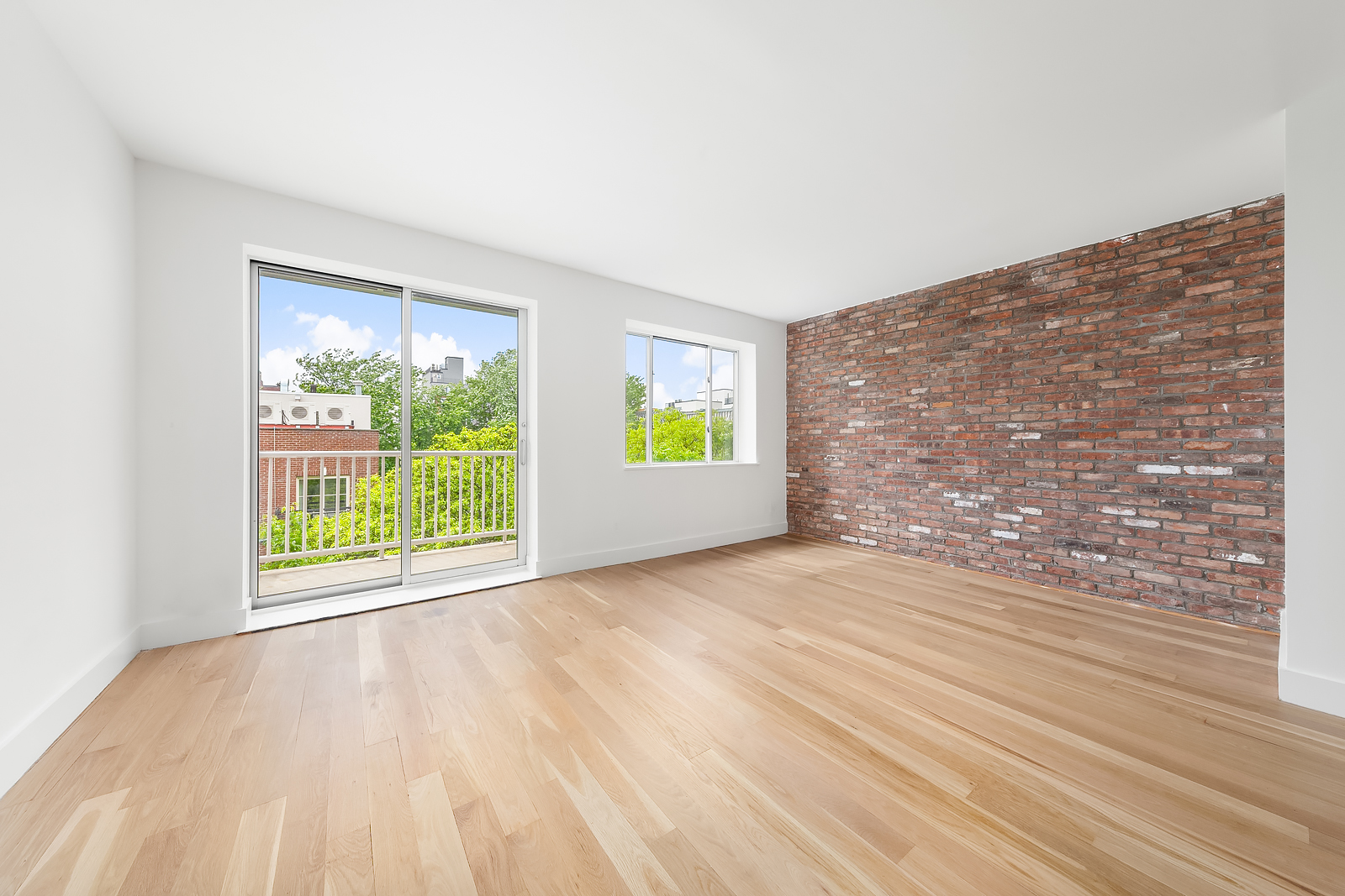 201 Spencer Street, Unit 5B Brooklyn, NY 11205 - Photo 1 of 9 a view of an empty room with a window