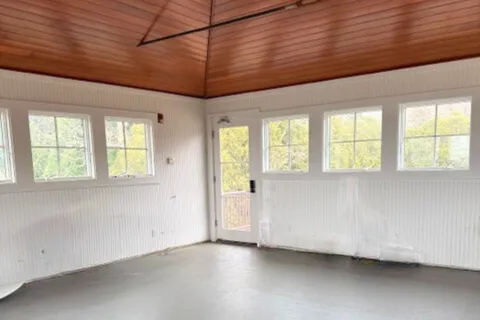 a room with furniture and windows