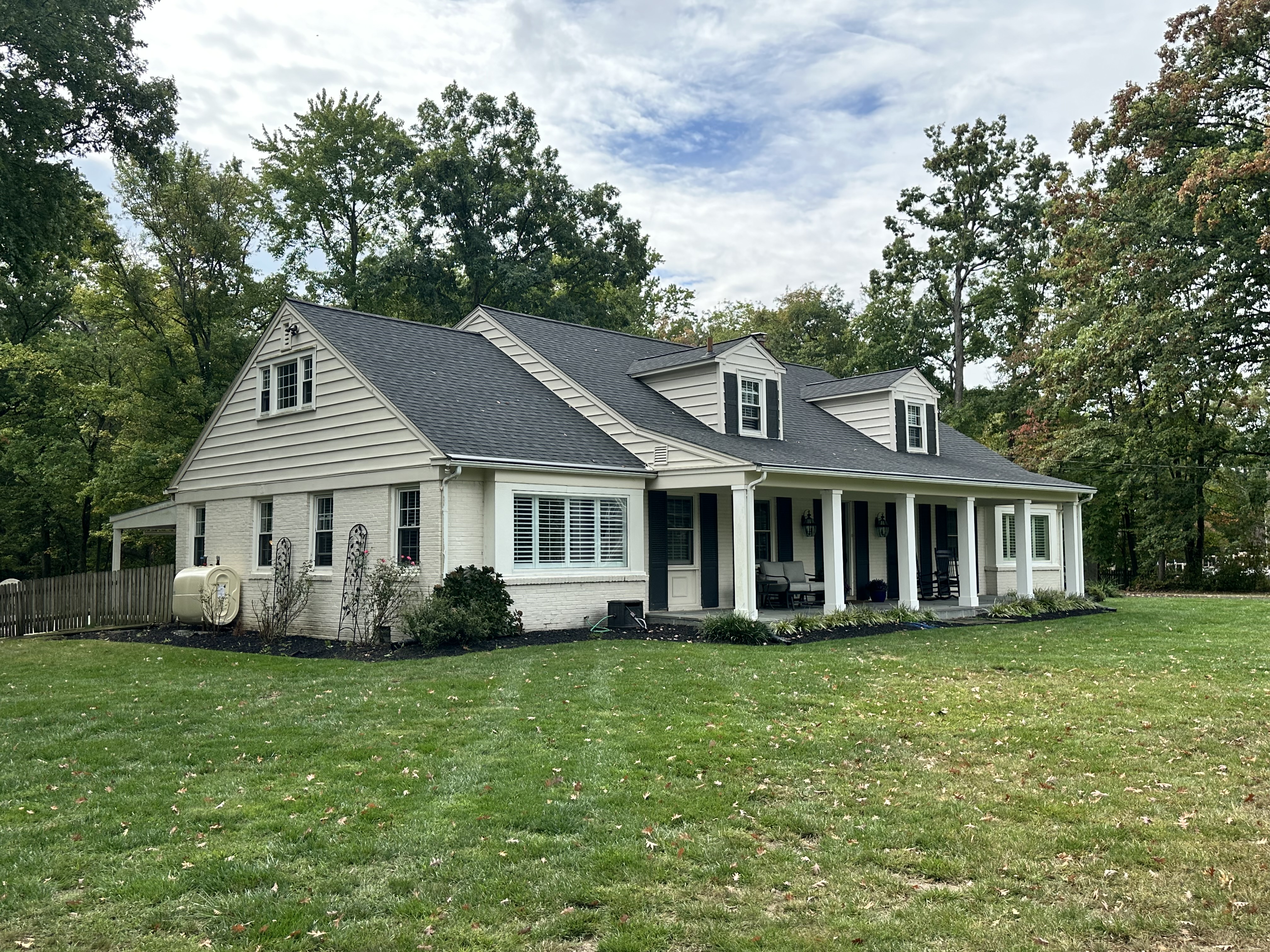 21 Andrews Road Malvern, PA 19355 - Photo 18 of 20 a front view of a house with a garden and trees