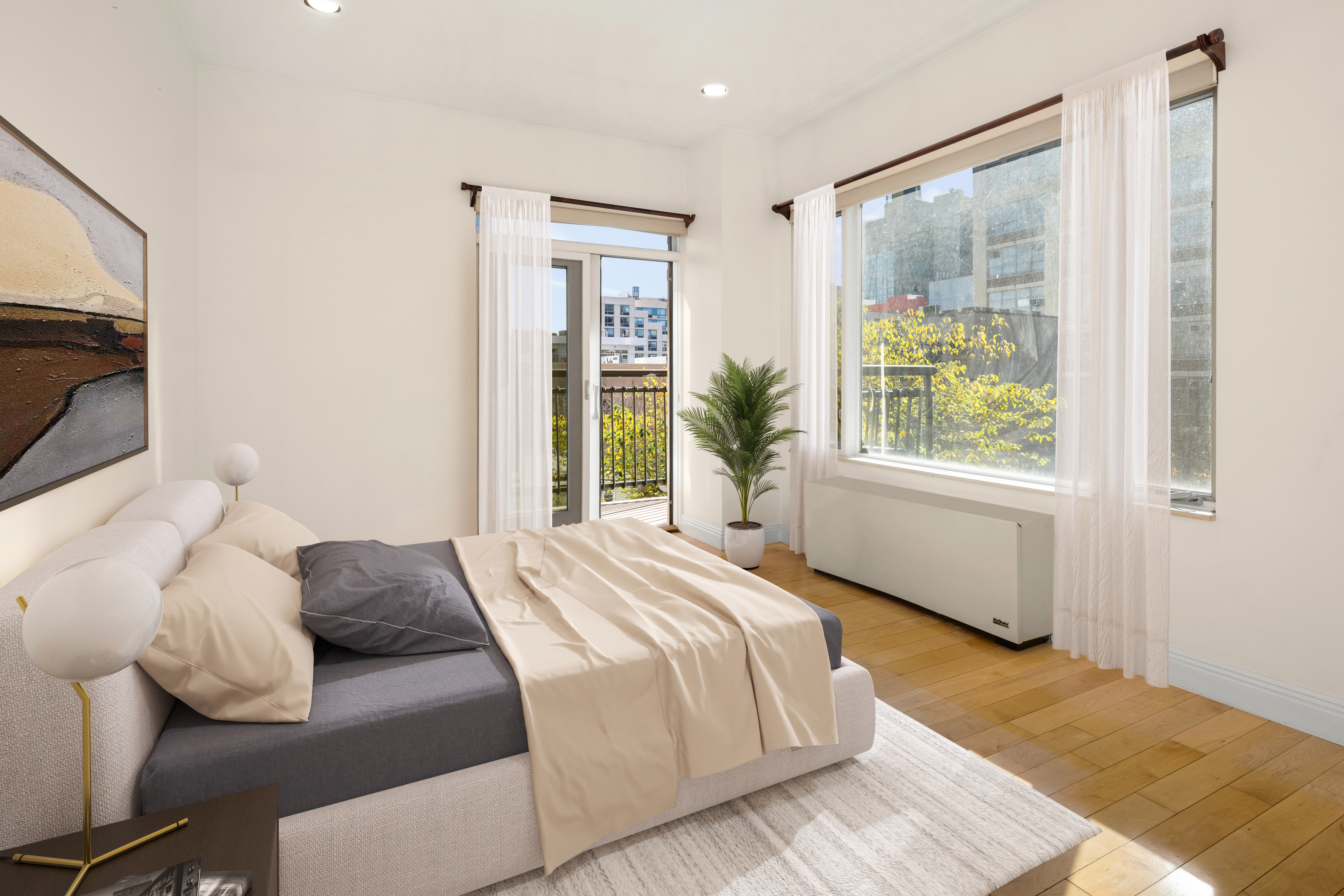 189 Bridge Street, Unit 3A Brooklyn, NY 11201 - Photo 7 of 19 a bedroom with a large bed and a window