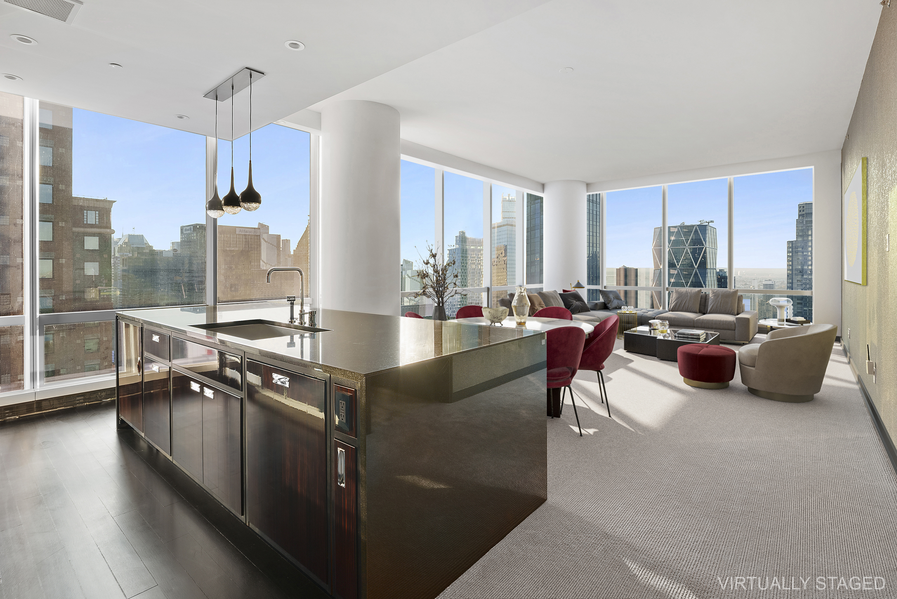 157 West 57th Street, Unit 49B Manhattan, NY 10019 - Photo 2 of 9 a living room with furniture a wooden floor and a large window