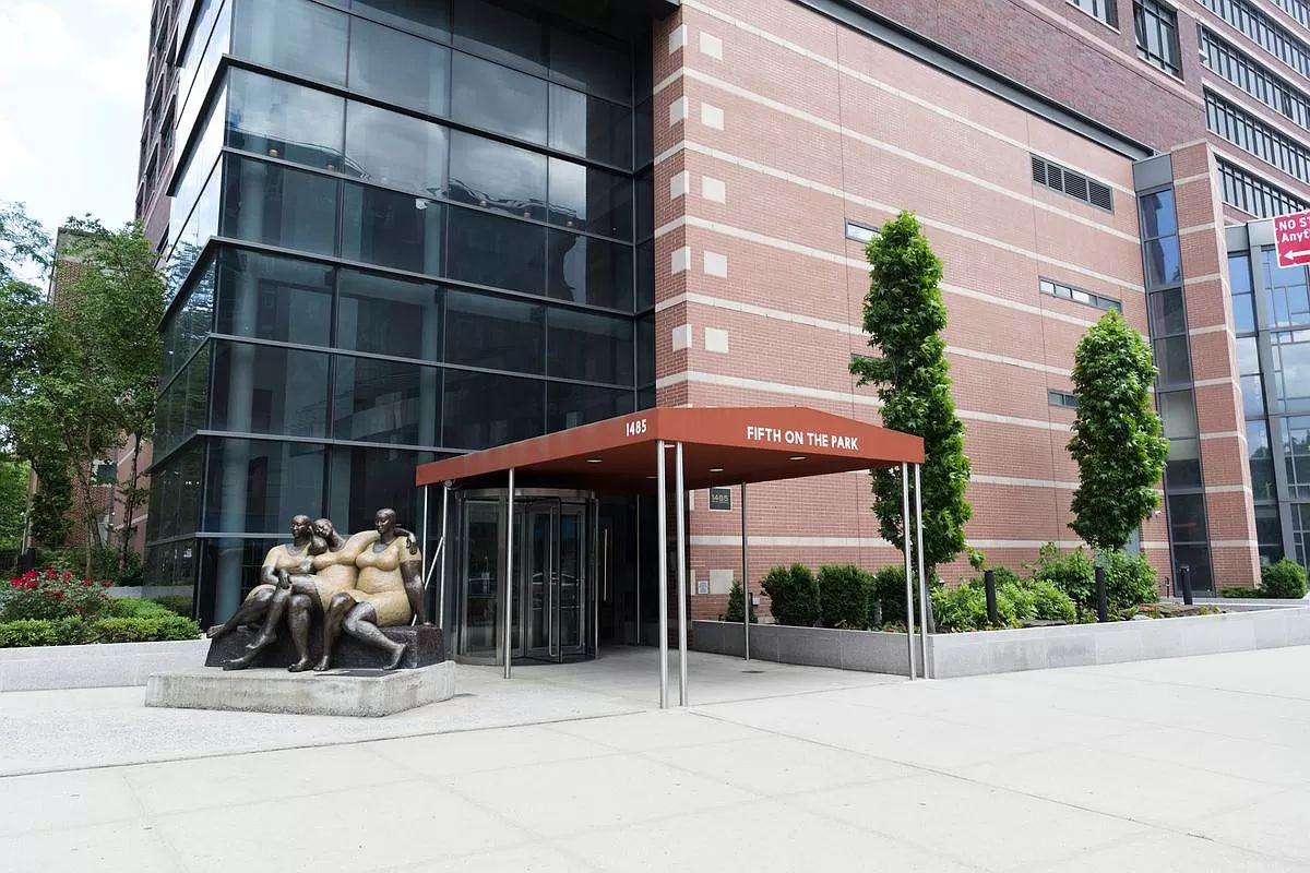 1485 5th Avenue, Unit 18/19H Manhattan, NY 10035 - Photo 21 of 24 a view of a chair and tables in patio of a building