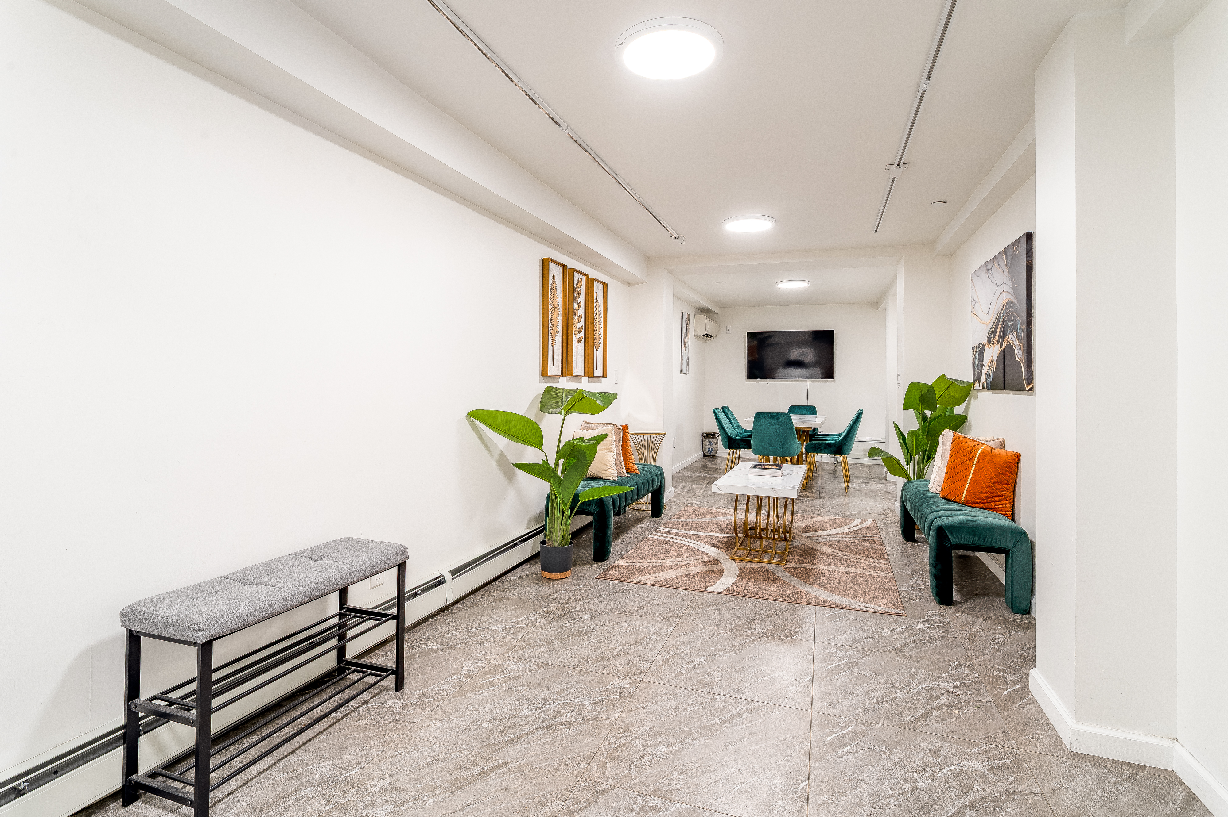 212 East 70th Street, Unit B Manhattan, NY 10021 - Photo 3 of 17 a living room with furniture and a wooden floor