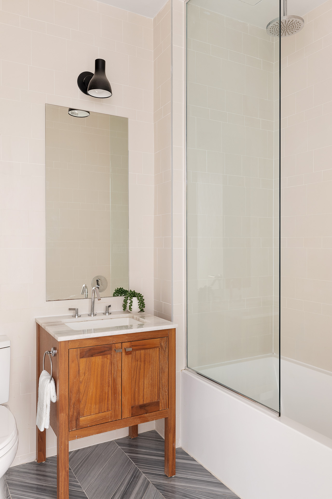 35 Duffield Street, Unit 2B Brooklyn, NY 11201 - Photo 8 of 10 a bathroom with a sink and a mirror