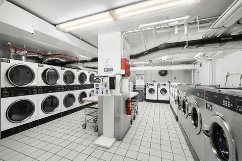 a view of a utility room with washer and dryer