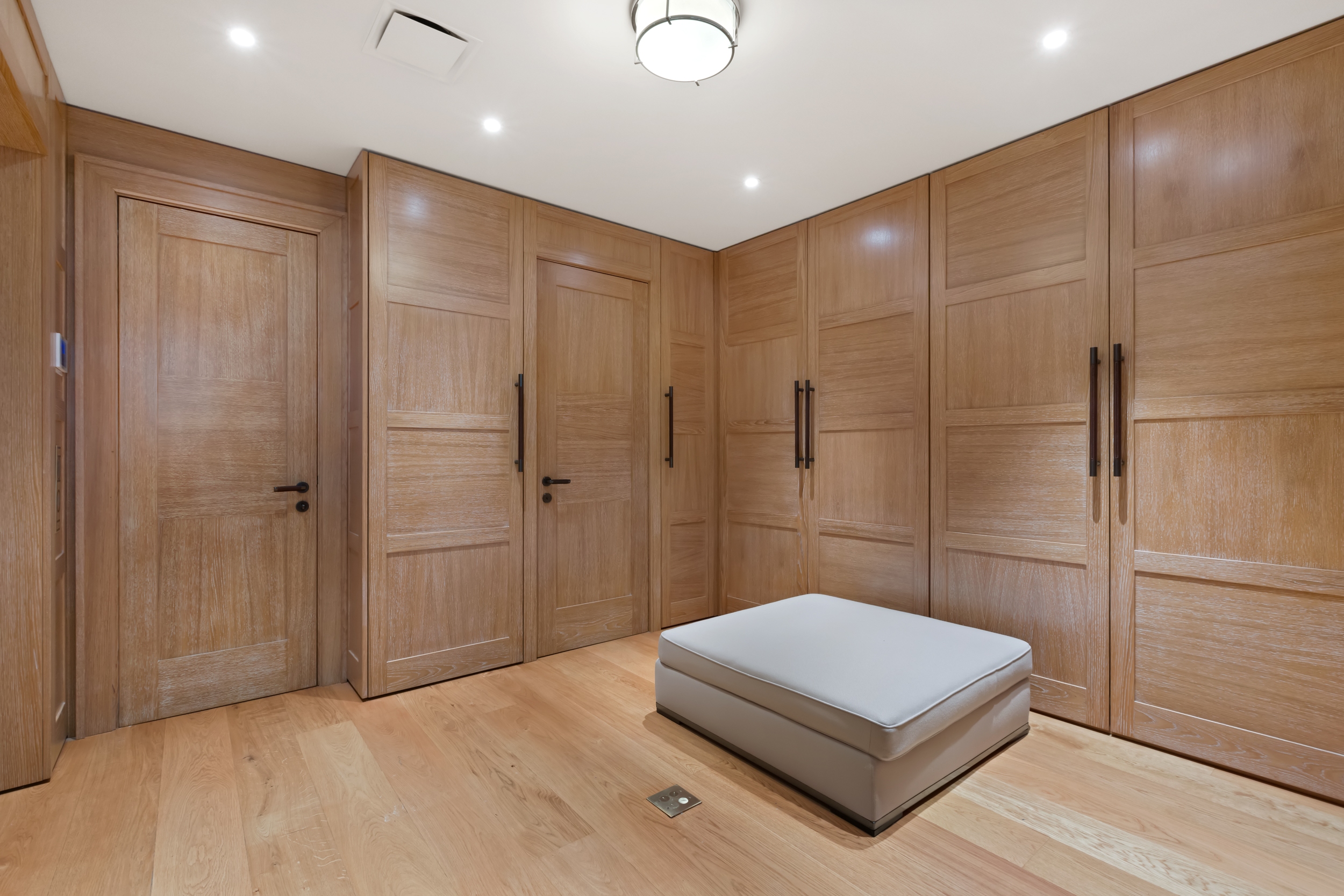 45 East 74th Street Manhattan, NY 10021 - Photo 20 of 33 a spacious bedroom with a bed and a shower