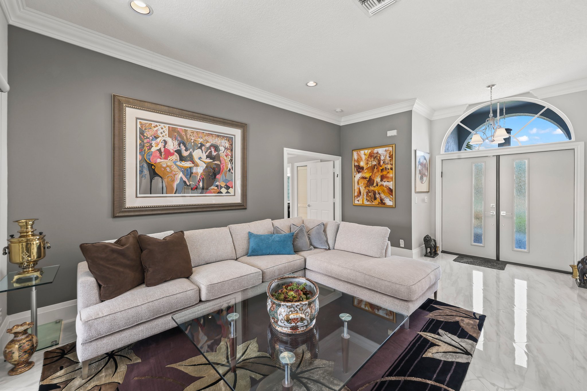 20317 Hacienda Court Boca Raton, FL 33498 - Photo 8 of 100 a living room with furniture and a wall painting