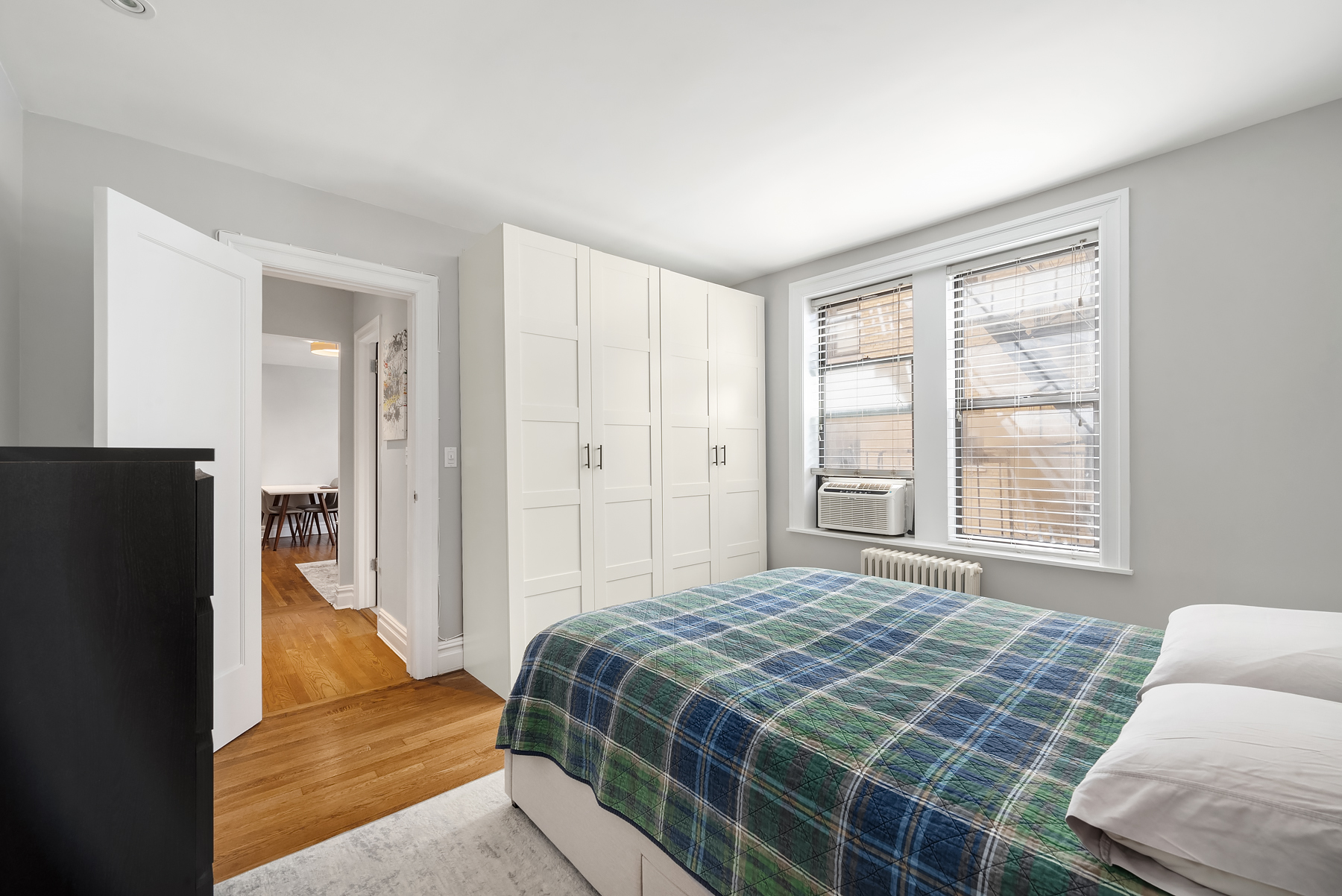 319 West 18th Street, Unit 4H Manhattan, NY 10011 - Photo 3 of 6 a bedroom with a bed and a window