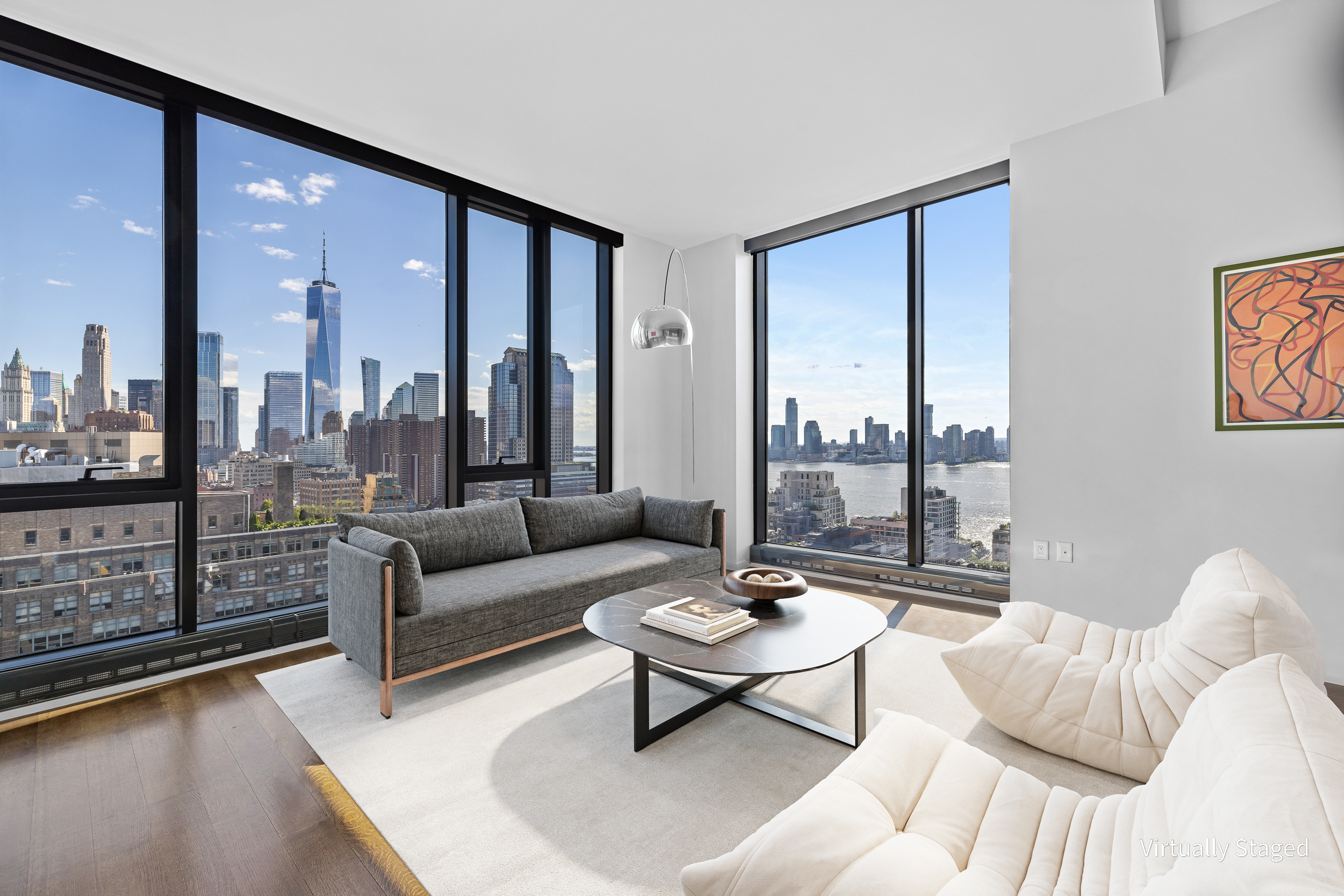 570 Broome Street, Unit 23A Manhattan, NY 10013 - Photo 2 of 13 a living room with furniture and a large window