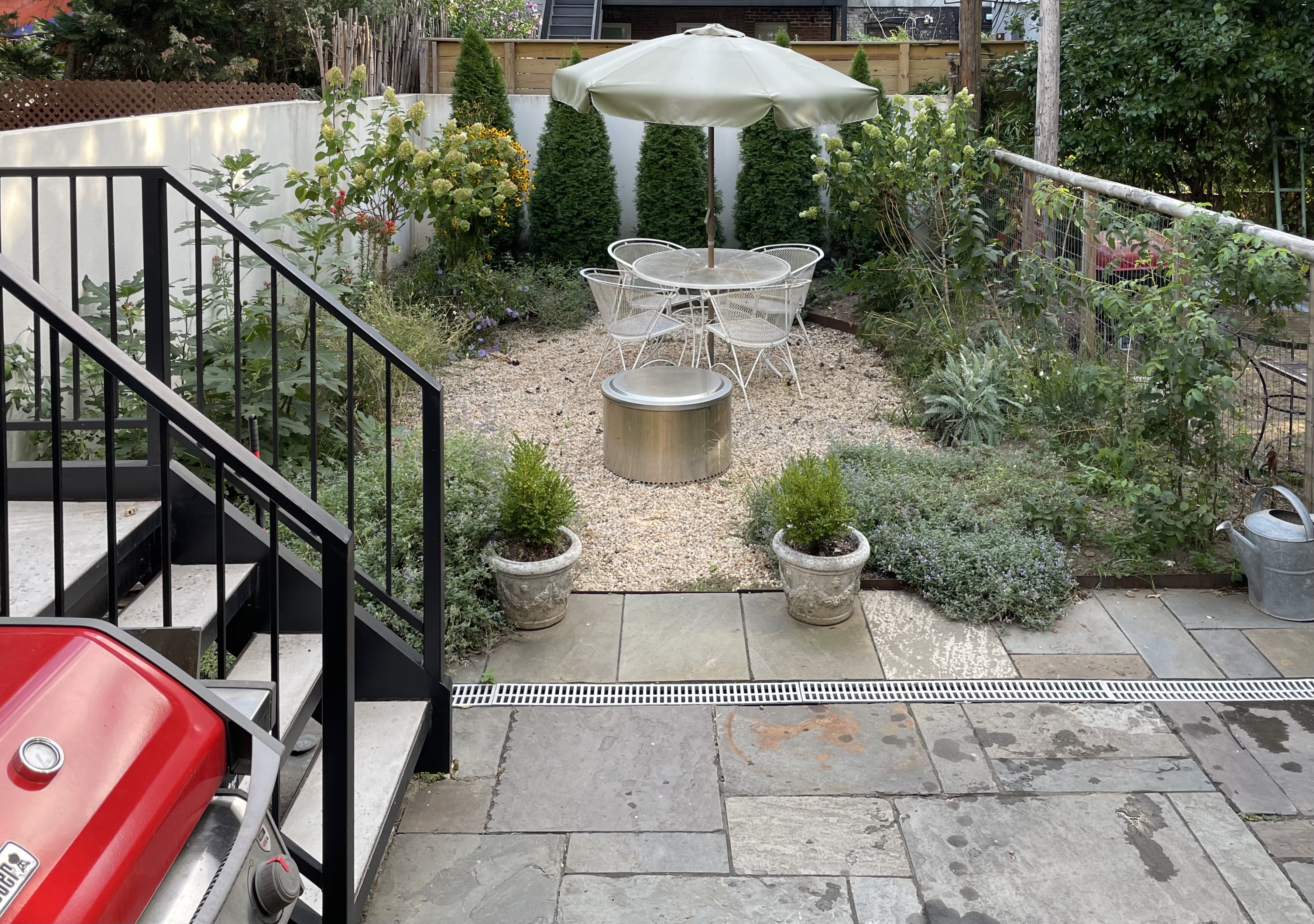 1370 Pacific Street, Unit 1 Brooklyn, NY 11216 - Photo 7 of 9 a view of a balcony with chairs and potted plants