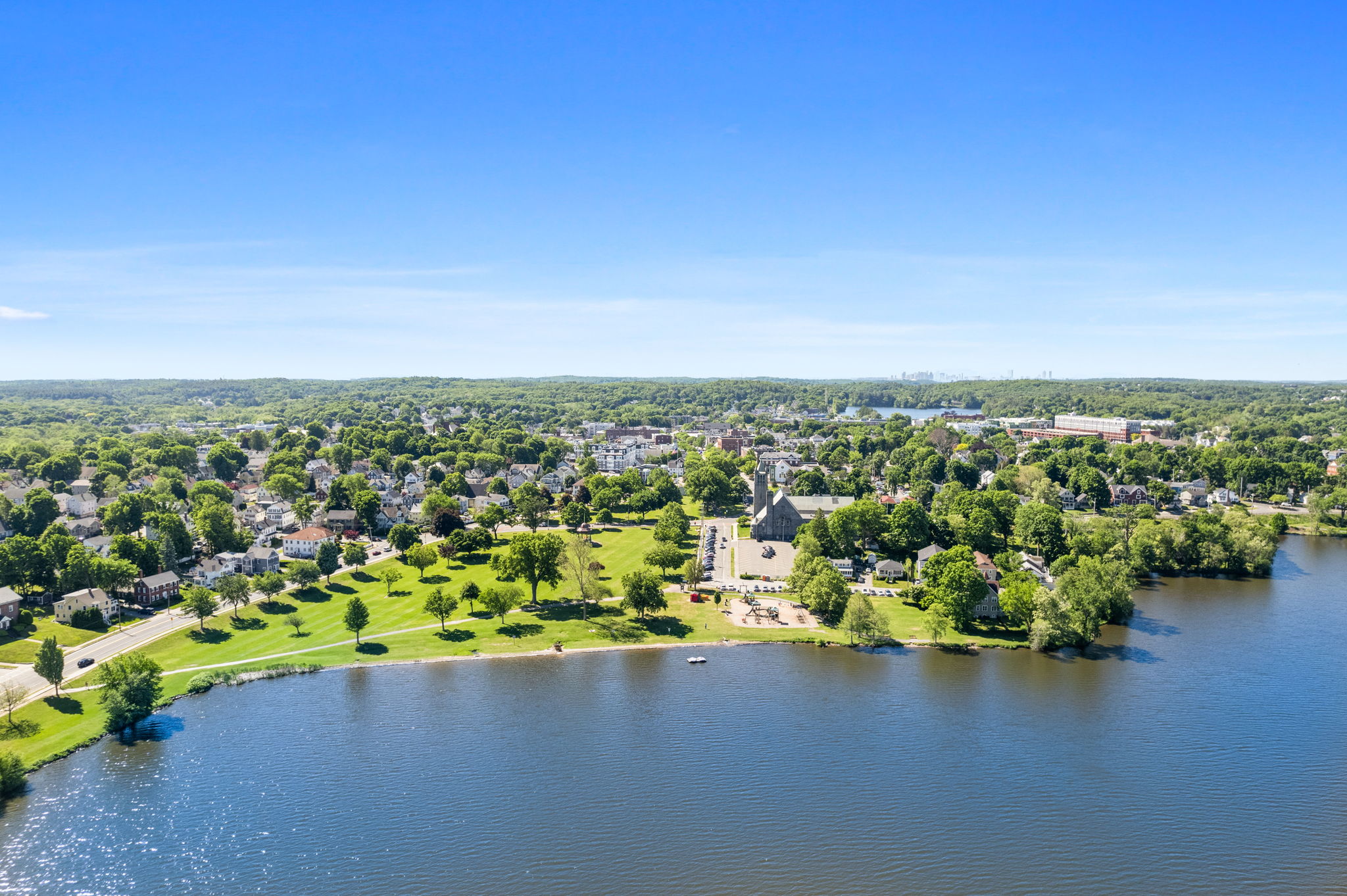 317 Main Street, Unit 7 Wakefield, MA 01880 - Photo 12 of 17 an aerial view of a houses with a lake view