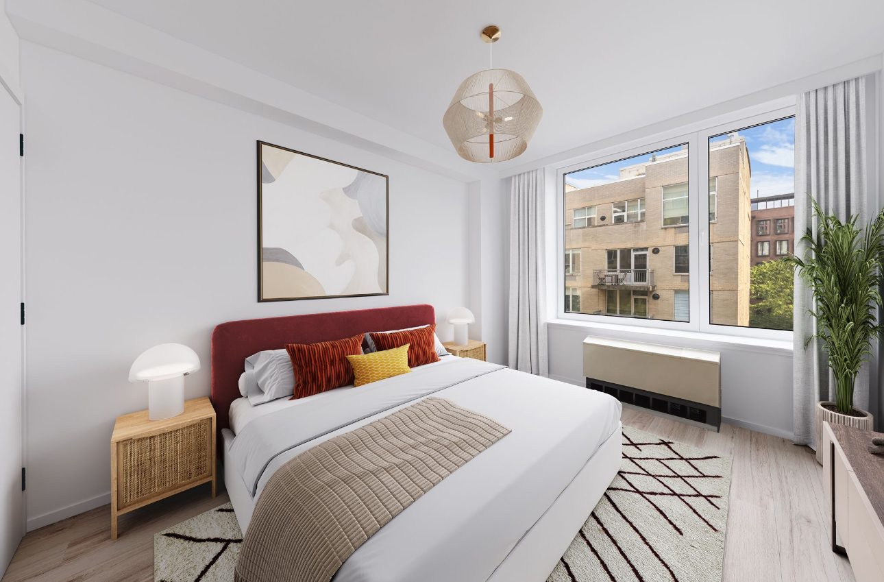 26 Broadway, Unit 402 Brooklyn, NY 11249 - Photo 8 of 17 a bedroom with bed and a large window