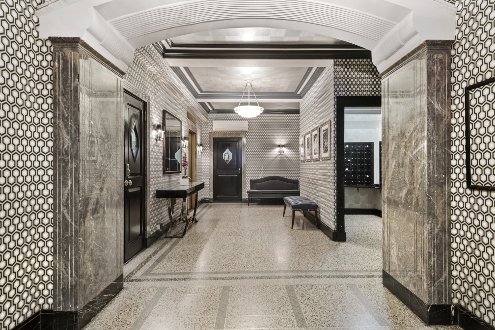 227 East 57th Street, Unit 2H Manhattan, NY 10022 - Photo 7 of 9 a view of lobby with elevator