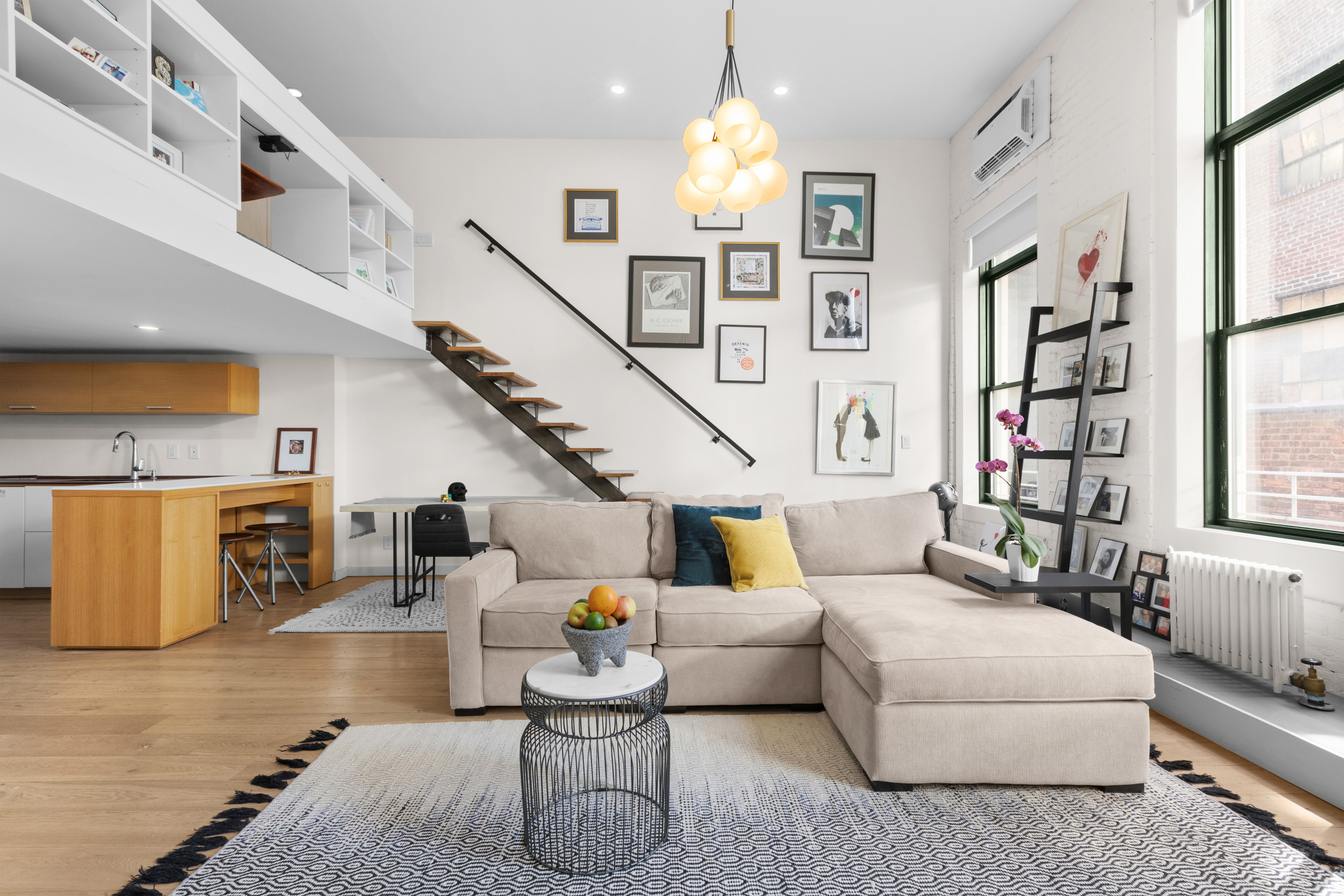 43 East 10th Street, Unit 2B Manhattan, NY 10003 - Photo 1 of 11 a living room with furniture