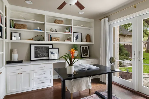 a view of a workspace with furniture