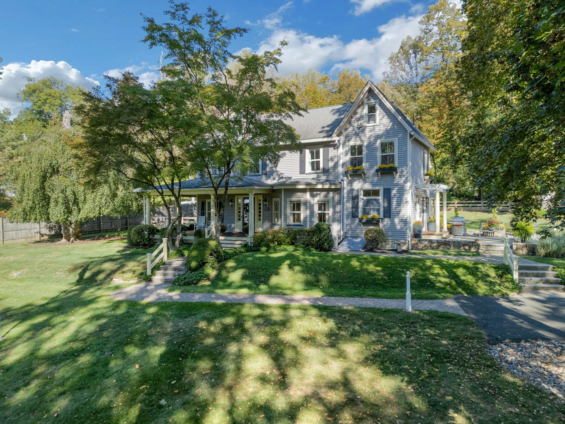 29 Evergreen Lane Watchung, NJ 07069 - Photo 5 of 54 a front view of a house with a yard