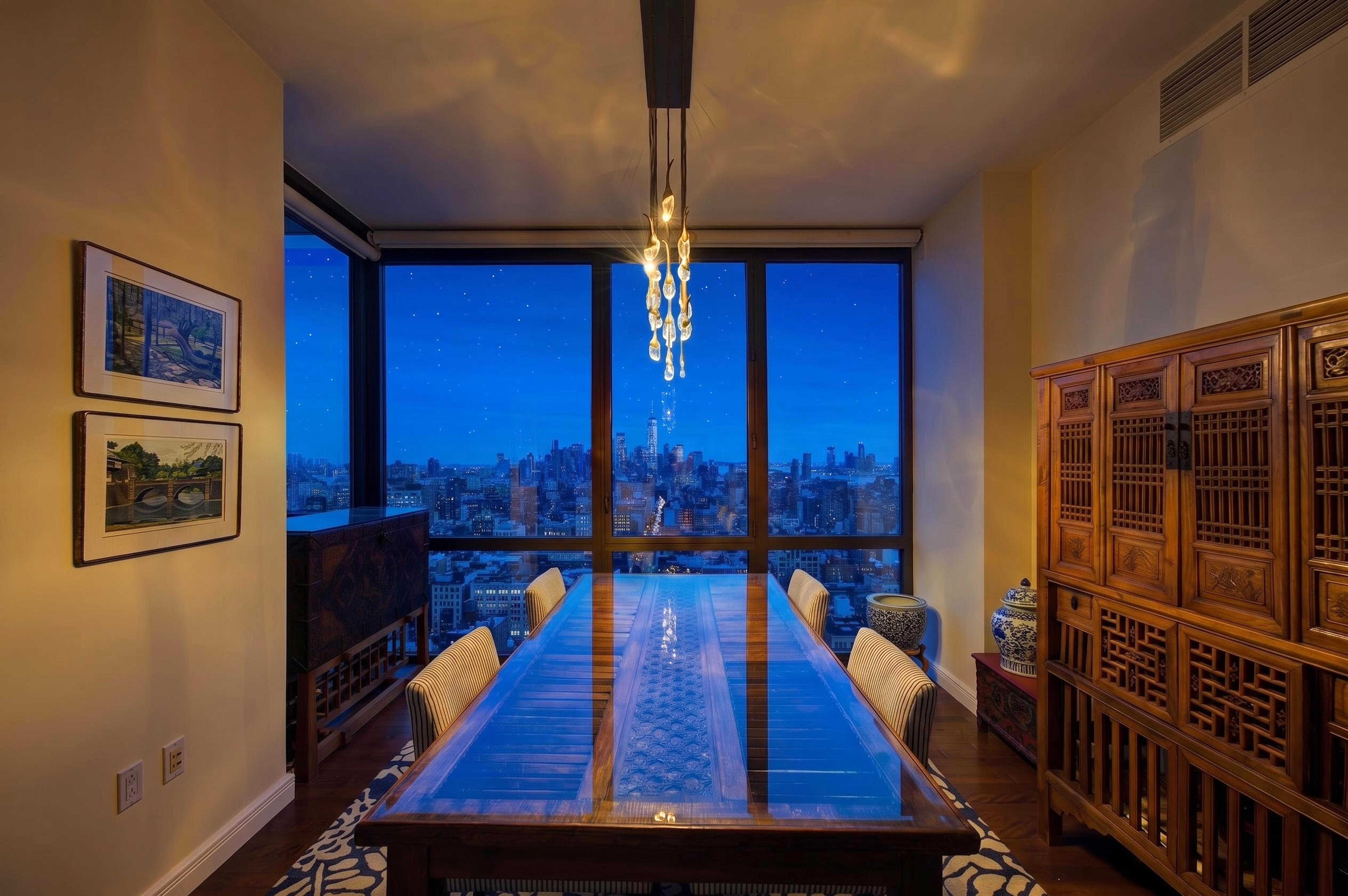 101 West 24th Street, Unit 36C Manhattan, NY 10011 - Photo 4 of 27 a living room with furniture gaming tables and a chandelier