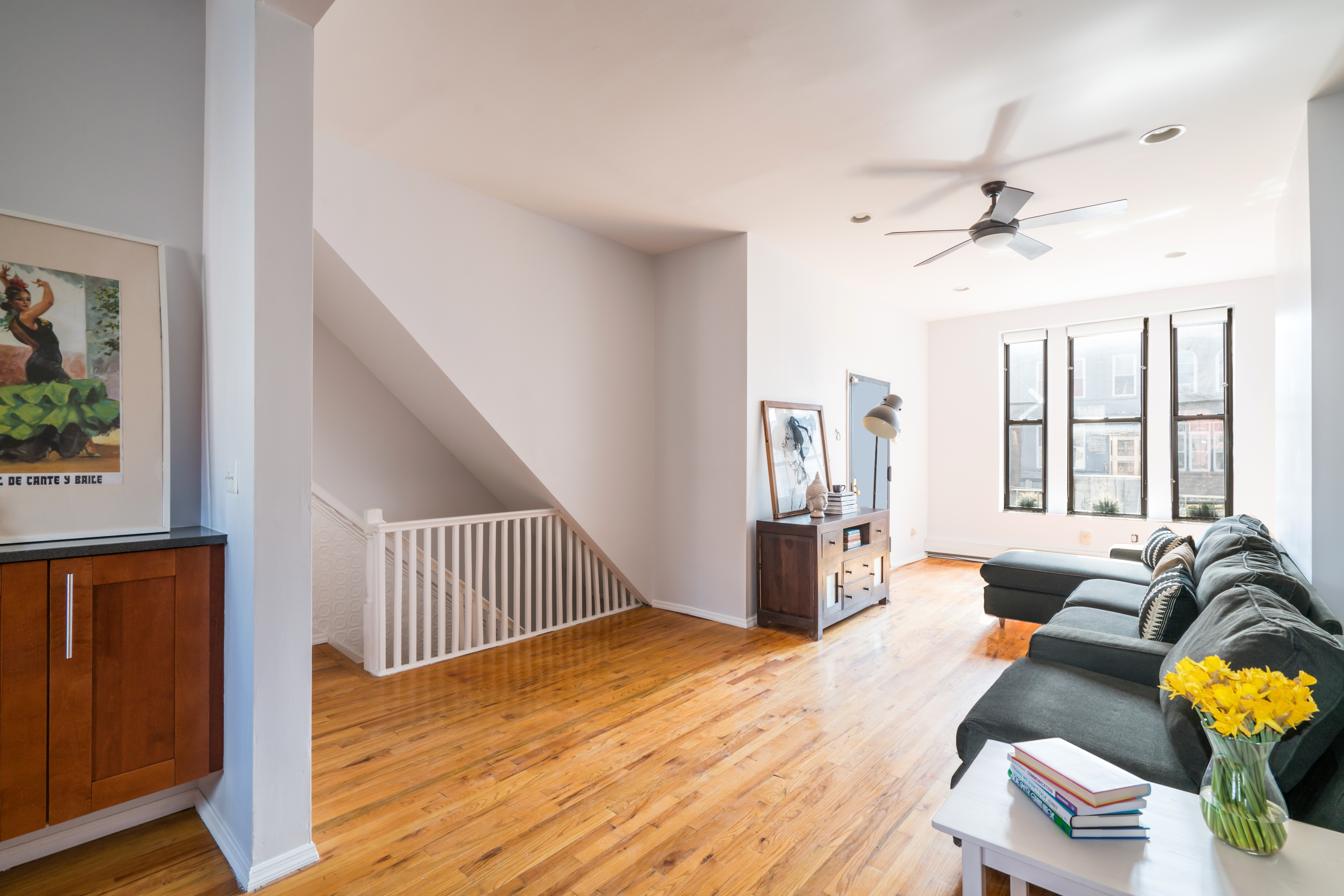 383 Bainbridge Street, Unit 1 Brooklyn, NY 11233 - Photo 3 of 14 a living room with furniture and wooden floor