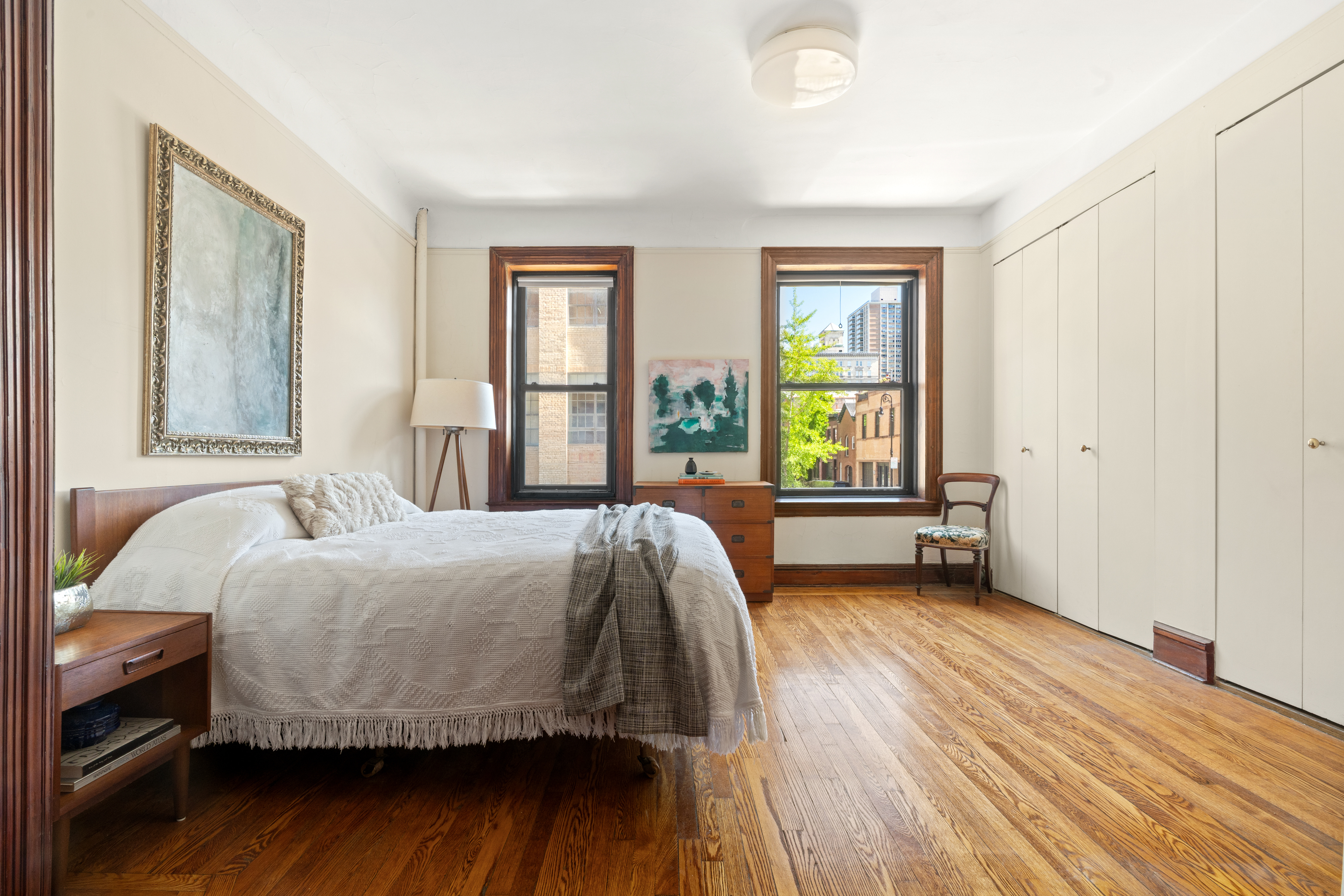 61 Pierrepont Street, Unit 24 Brooklyn, NY 11201 - Photo 6 of 11 a bedroom with a bed and a window