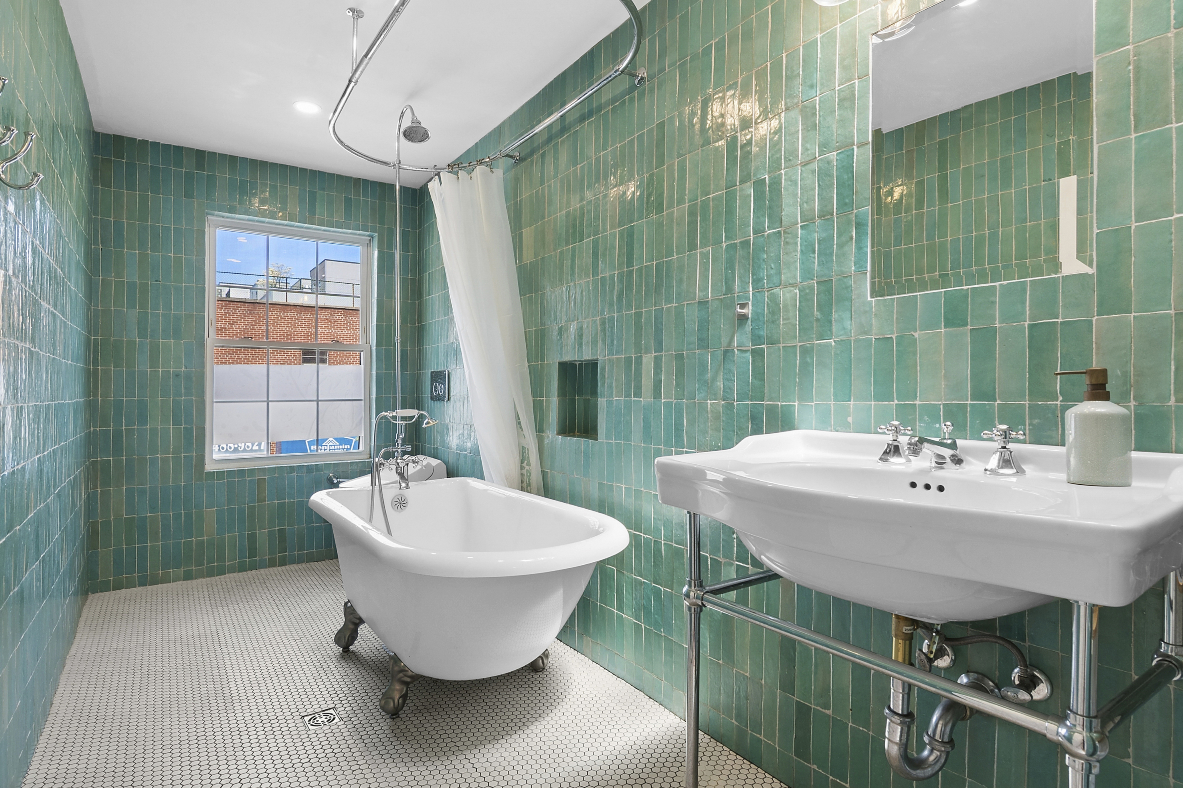 190 Concord Street Brooklyn, NY 11201 - Photo 9 of 14 a bathroom with a sink toilet and shower