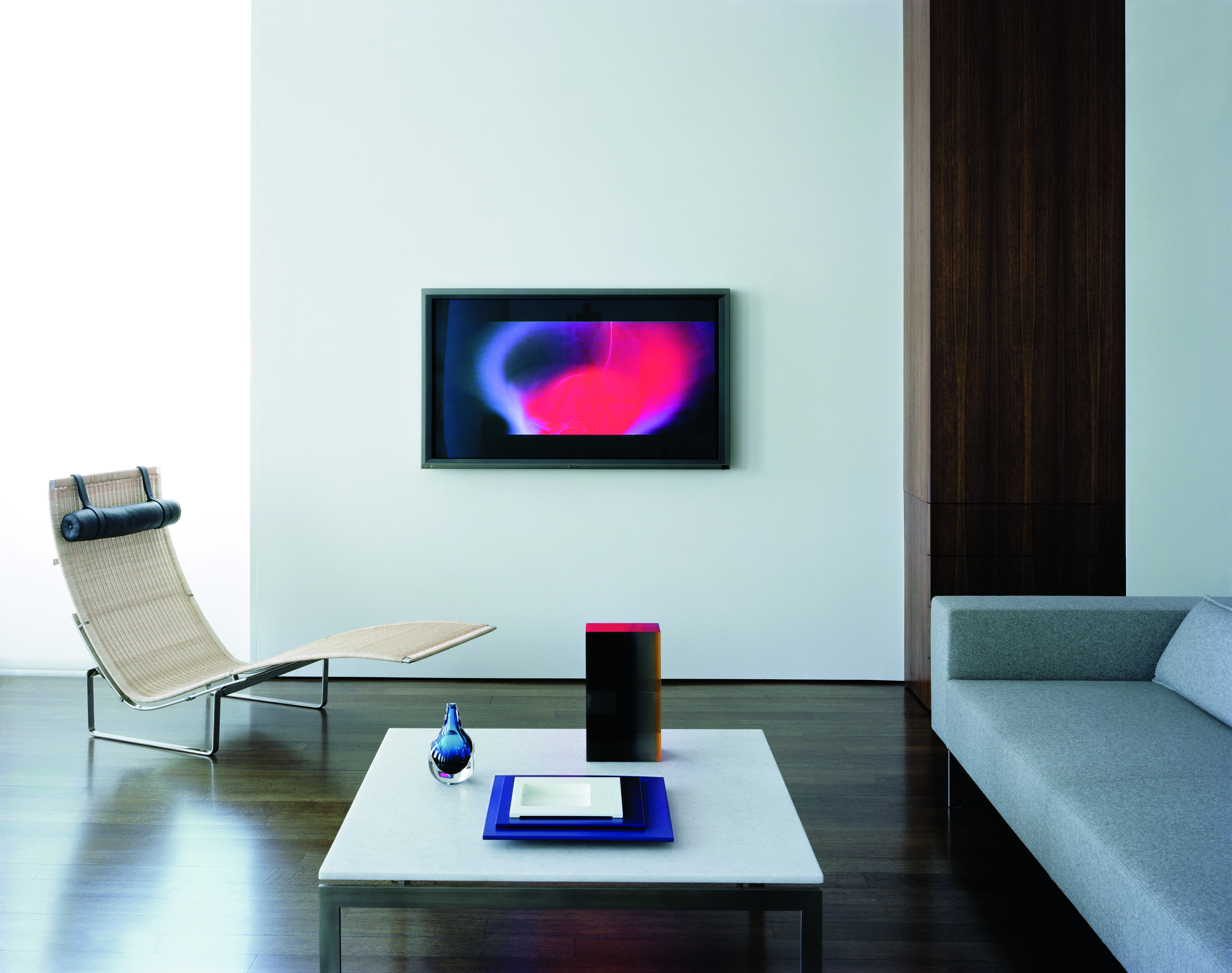 158 Mercer Street, Unit 7MERCER Manhattan, NY 10012 - Photo 5 of 13 a living room with furniture and wooden floor