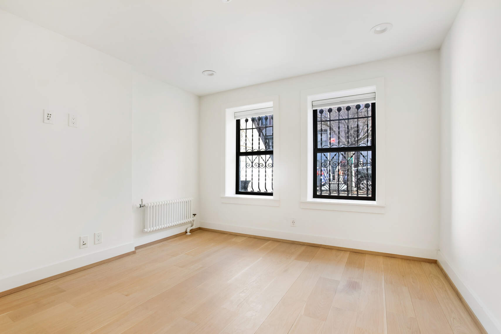 14 Hampton Place Brooklyn, NY 11213 - Photo 4 of 12 an empty room with windows