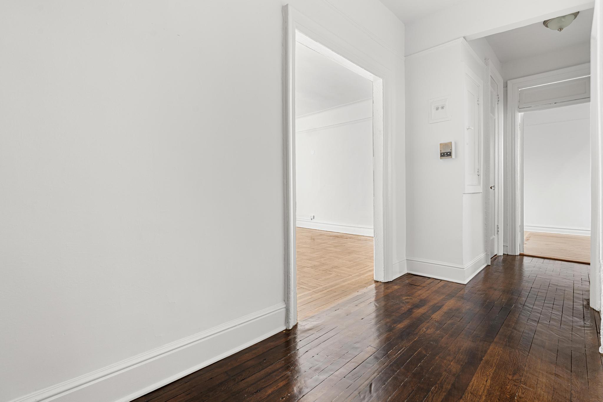 1001 President Street, Unit L2 Brooklyn, NY 11225 - Photo 11 of 19 a view of an empty room with wooden floor