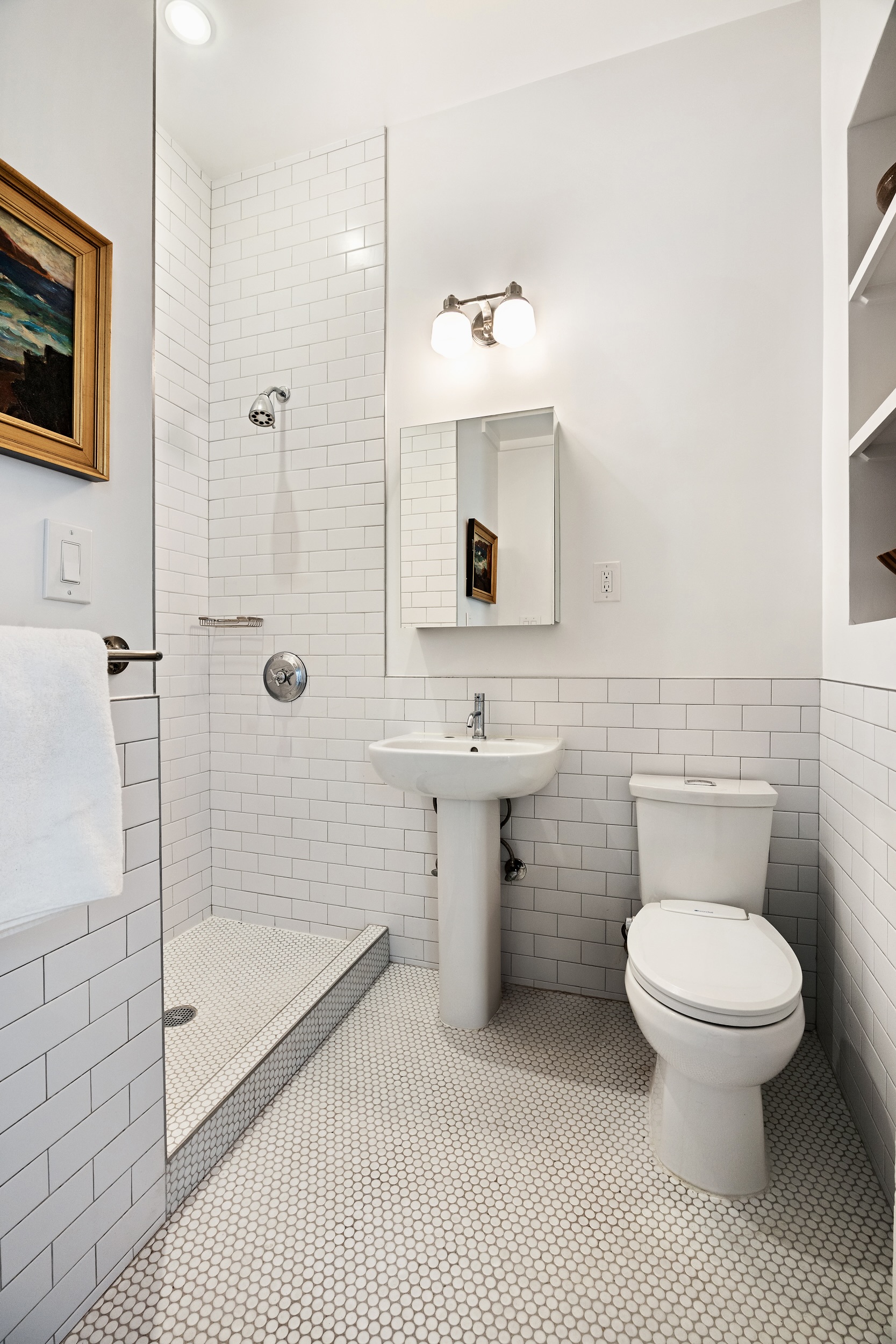134 Berkeley Place, Unit 3 Brooklyn, NY 11217 - Photo 16 of 30 a bathroom with a toilet sink and shower