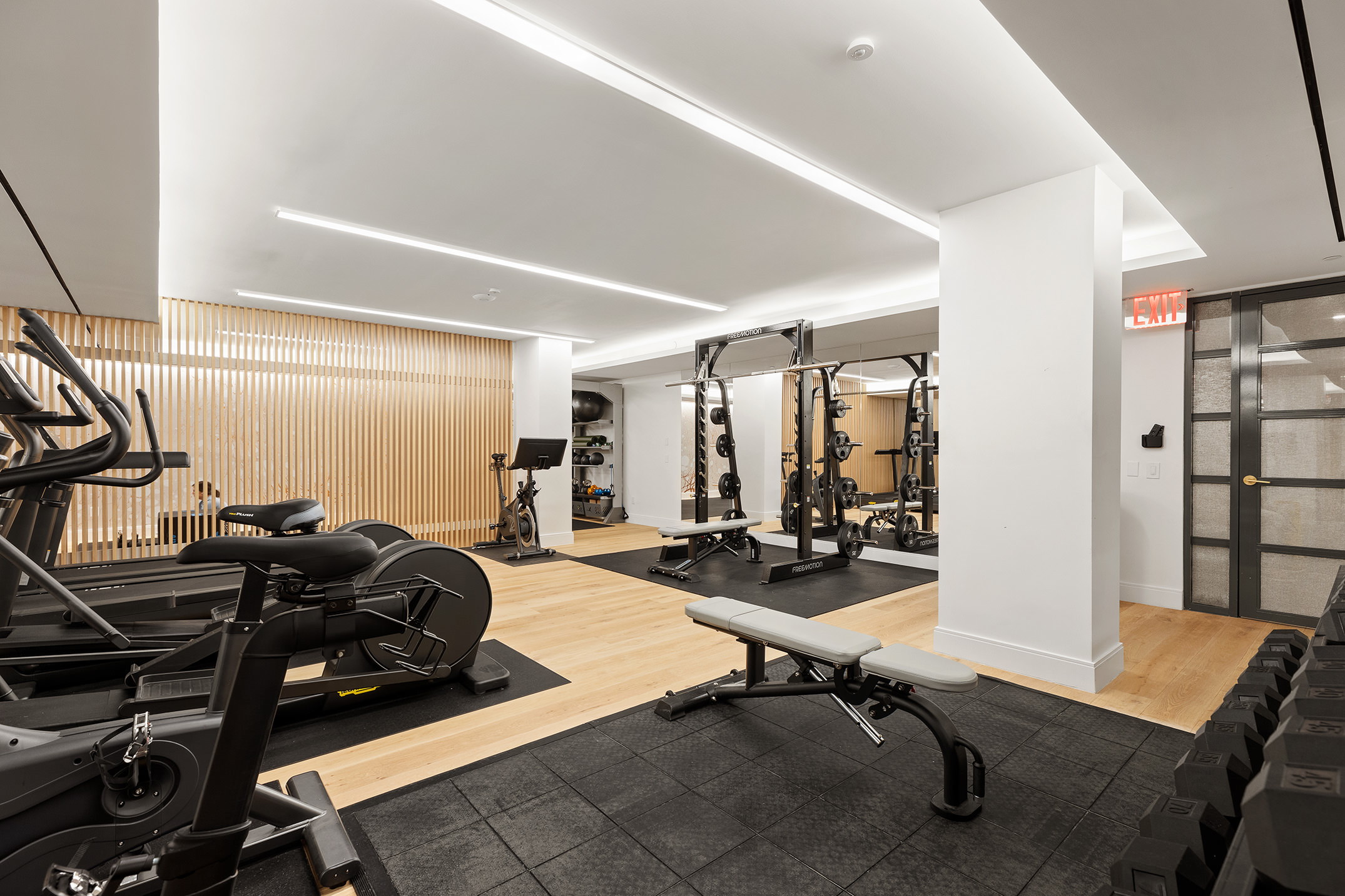 347 Henry Street, Unit 5B Brooklyn, NY 11201 - Photo 15 of 25 a view of a room with gym equipment