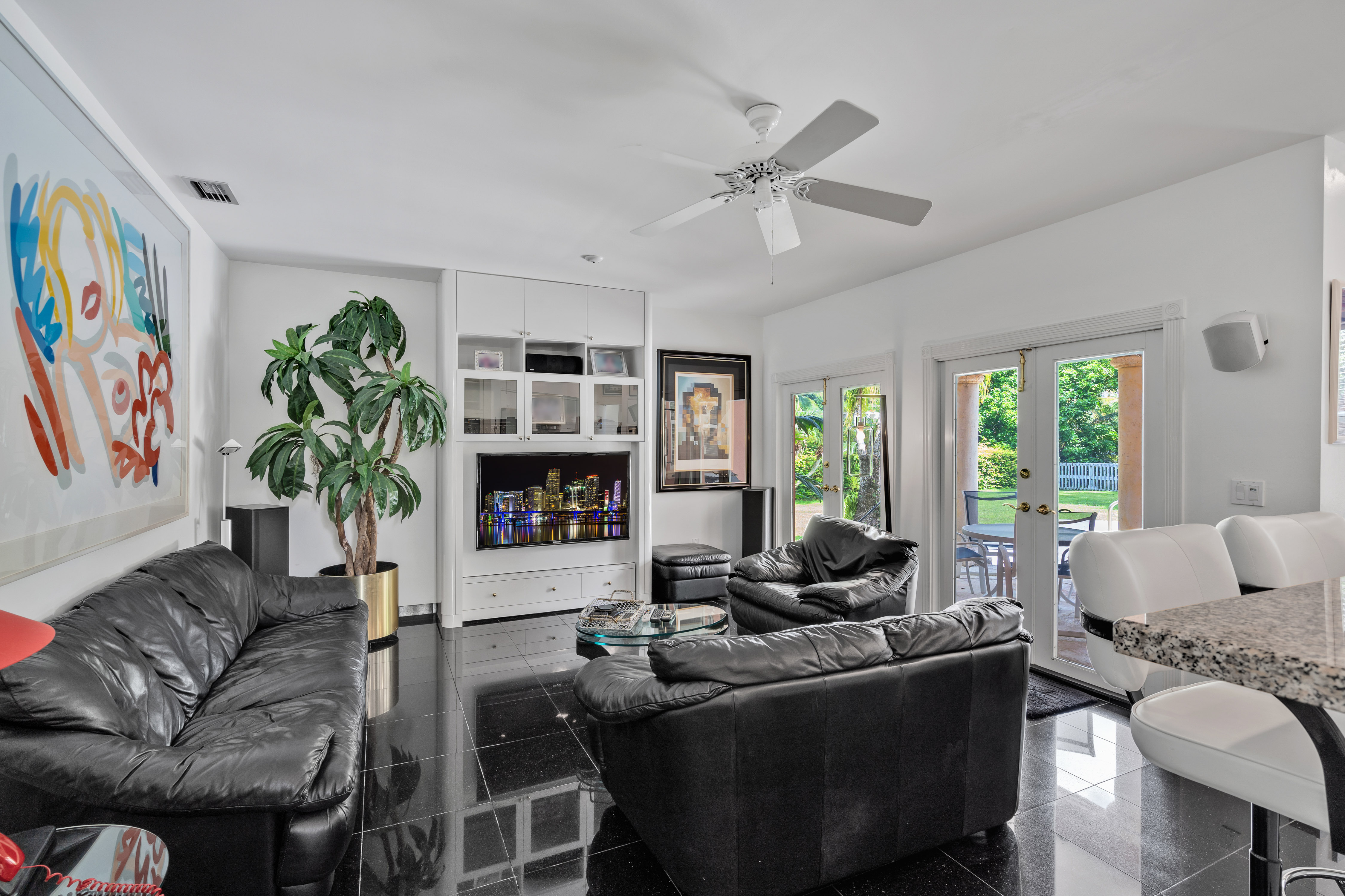 8768 Southwest 62nd Court Miami, FL 33156 - Photo 19 of 56 a living room with furniture plant and a window
