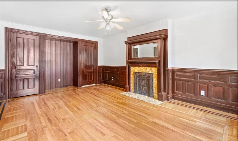 580 Decatur Street, Unit 1 Brooklyn, NY 11233 - Photo 2 of 8 a bedroom with a bed dresser and a window