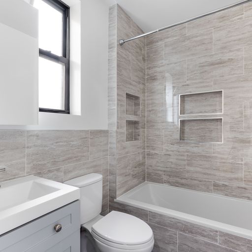 317 West 87th Street, Unit 8C Manhattan, NY 10024 - Photo 8 of 9 a bathroom with a sink a toilet and bathtub