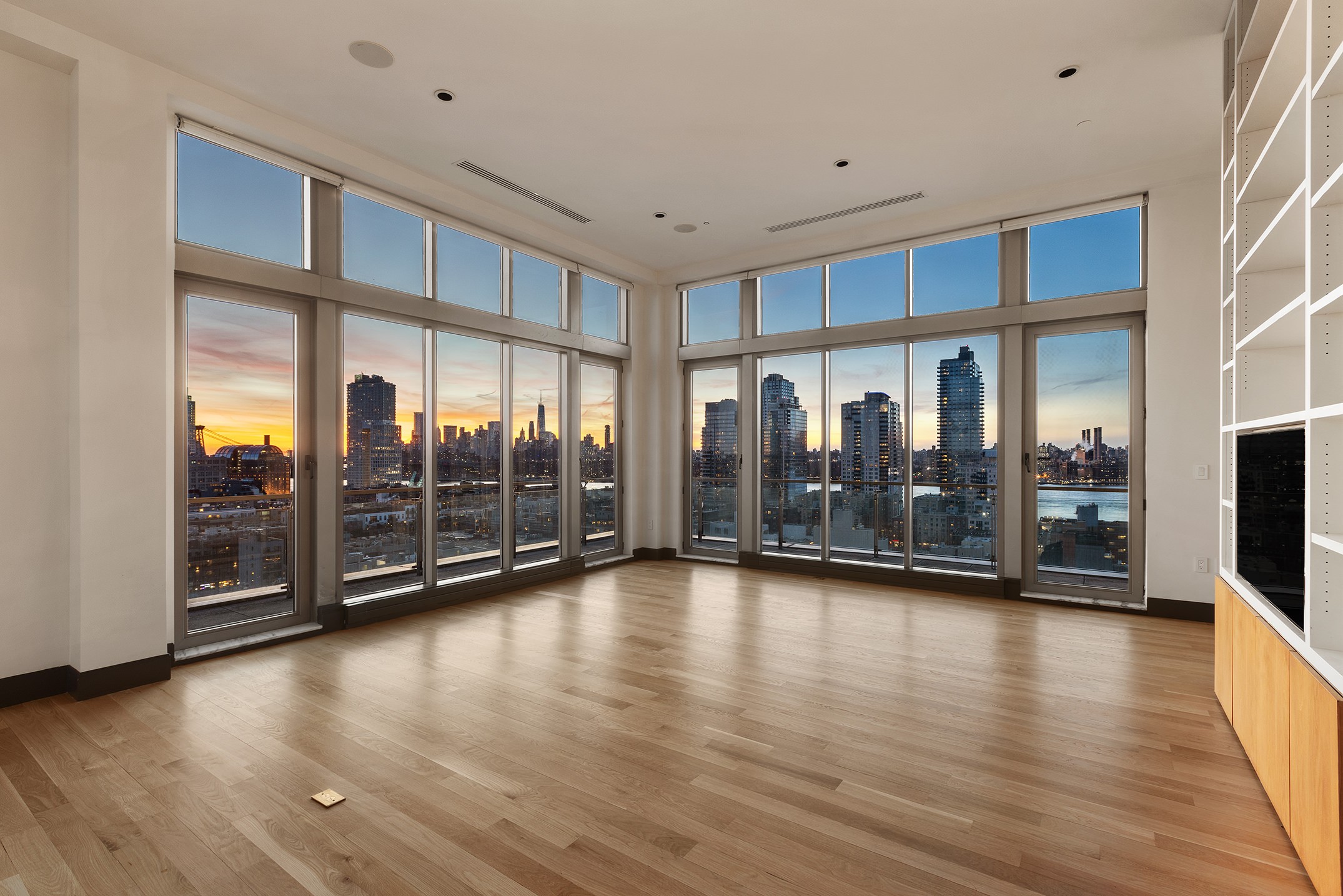 144 North 8th Street, Unit PH2 Brooklyn, NY 11249 - Photo 16 of 20 a view of room with window and hardwood floor