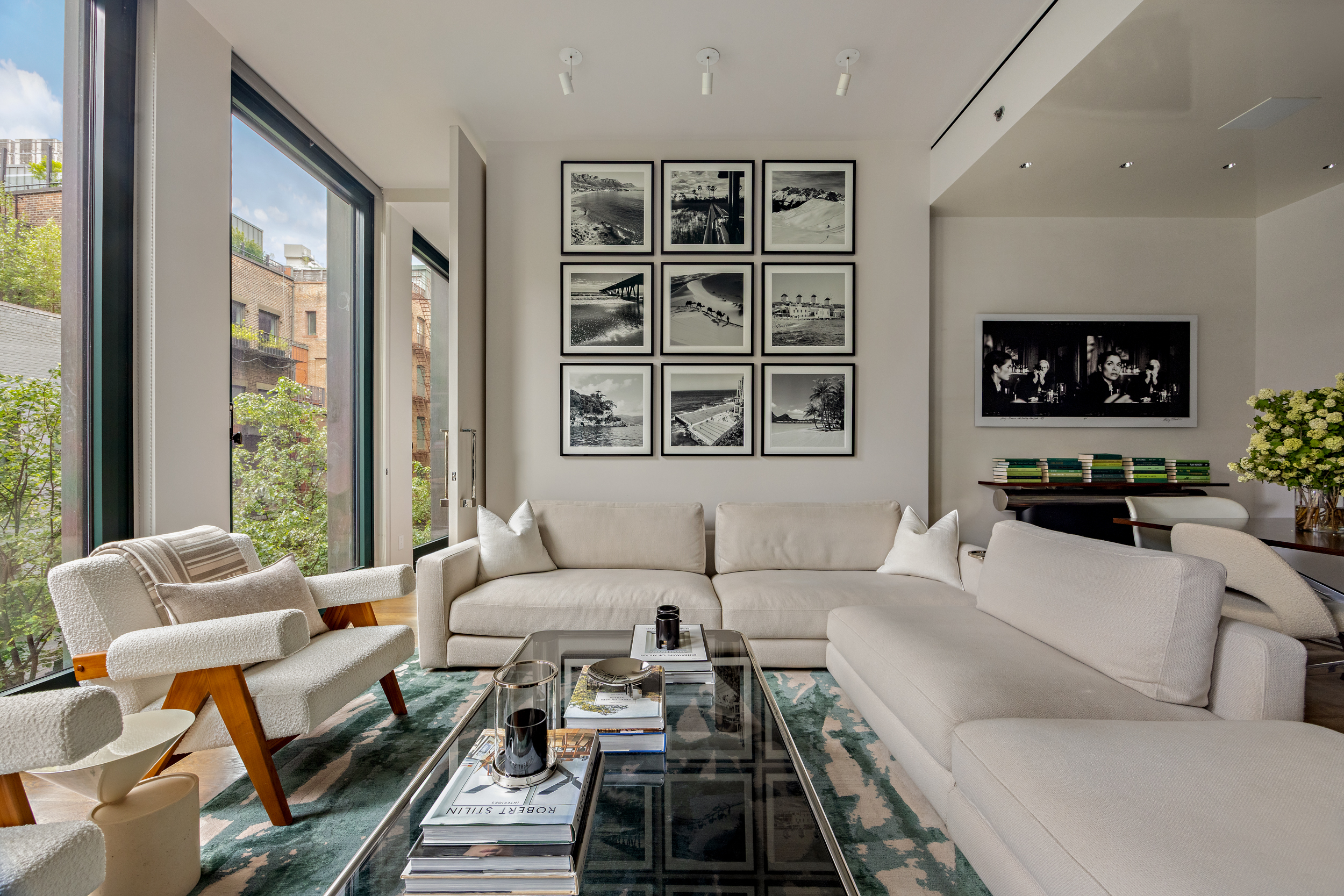 40 Bond Street, Unit 6D Manhattan, NY 10012 - Photo 8 of 23 a living room with furniture or couch and a flat screen tv