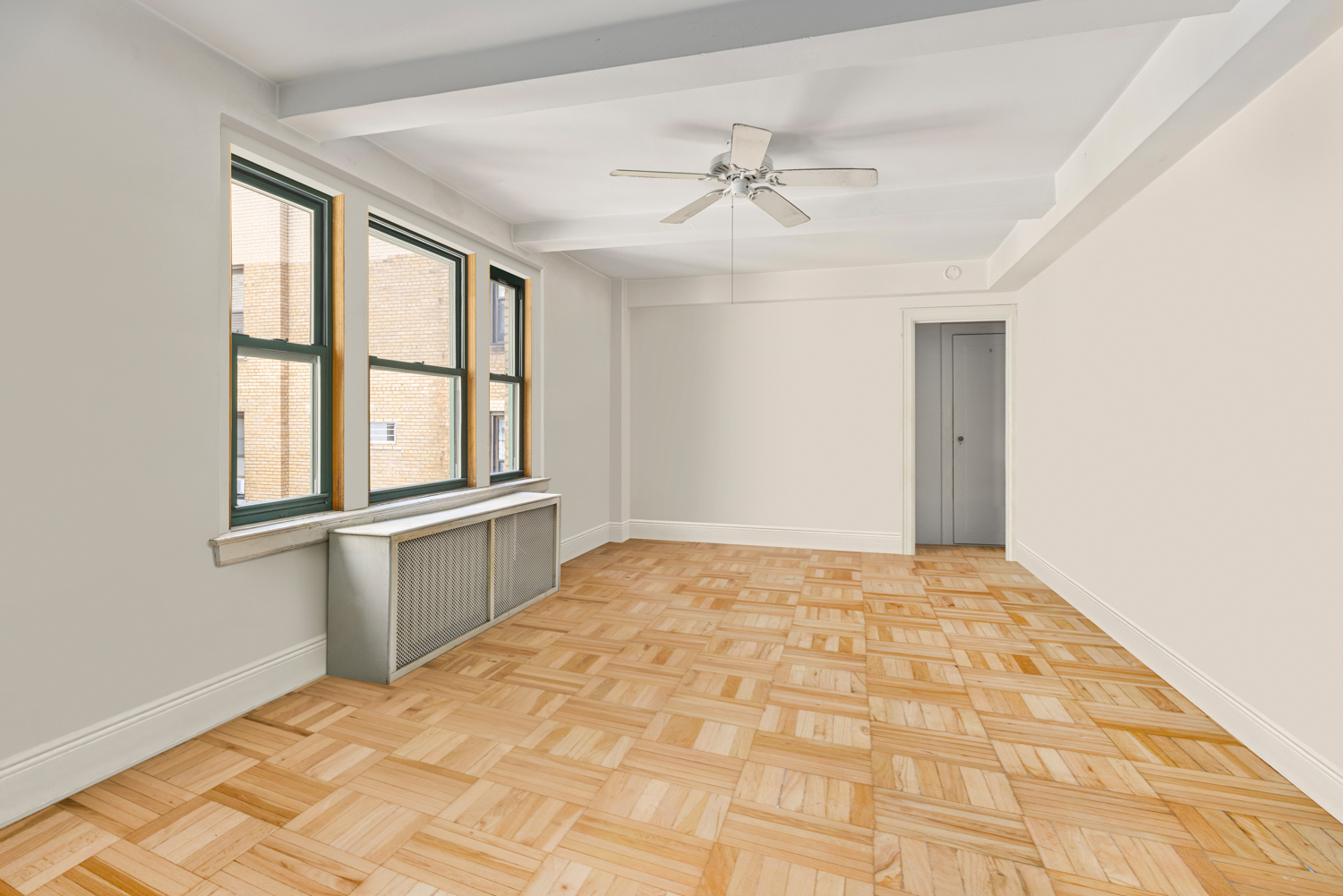 65 West 95th Street, Unit 8C Manhattan, NY 10025 - Photo 3 of 15 a view of an empty room with a window