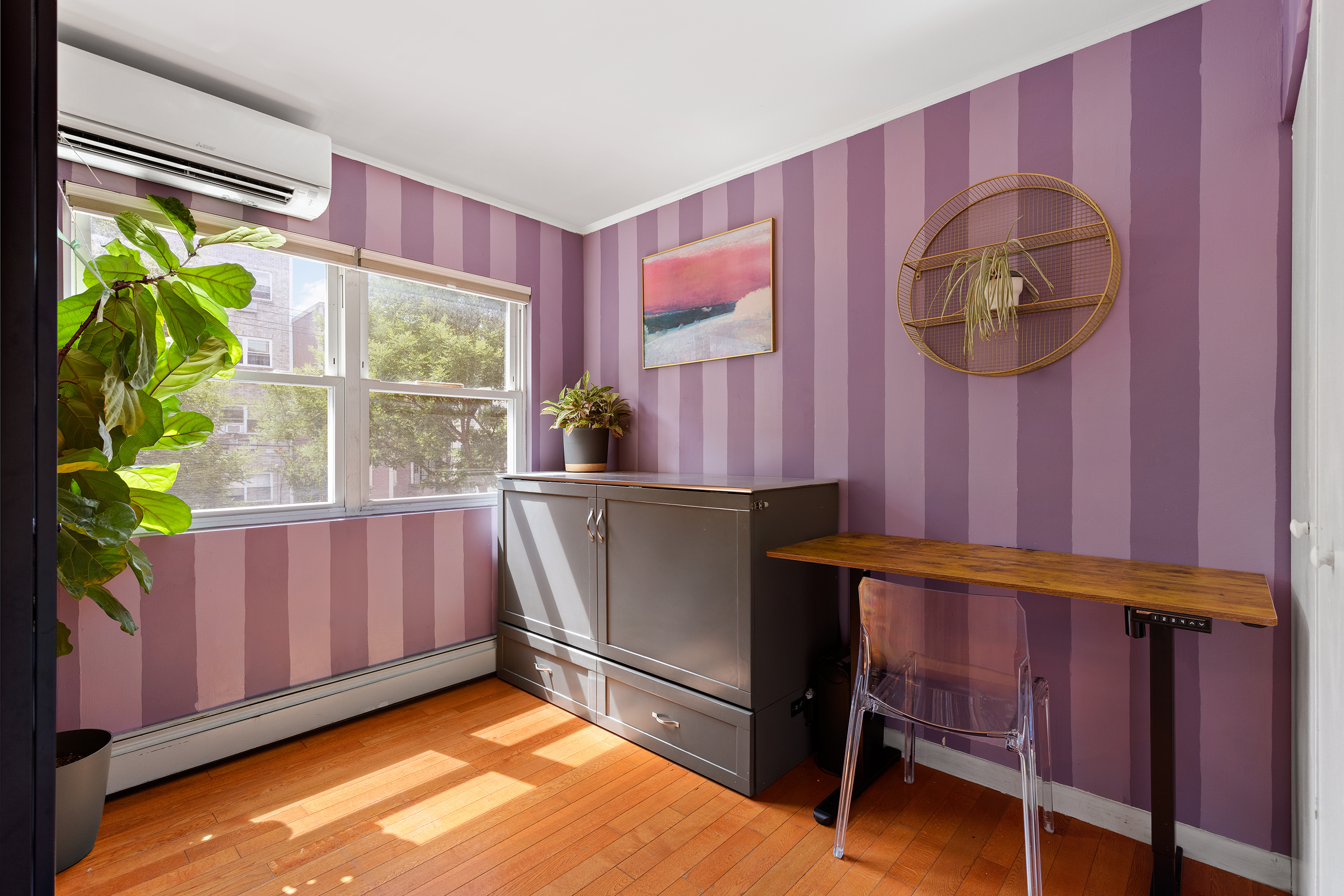1427 Greene Avenue, Unit 2 Brooklyn, NY 11237 - Photo 3 of 9 a view of walk in closet with window and stairs
