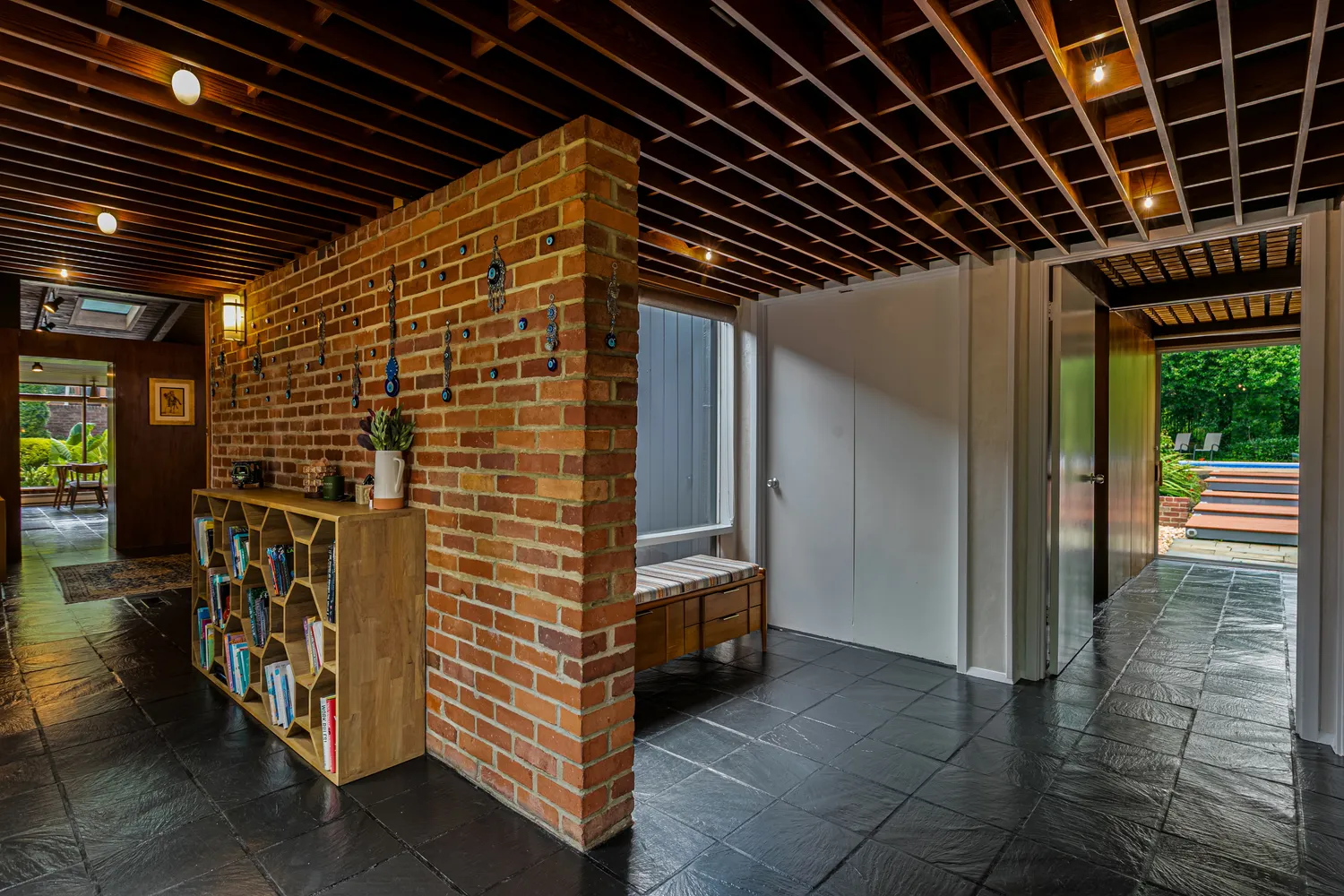 a view of a living room with furniture and a window