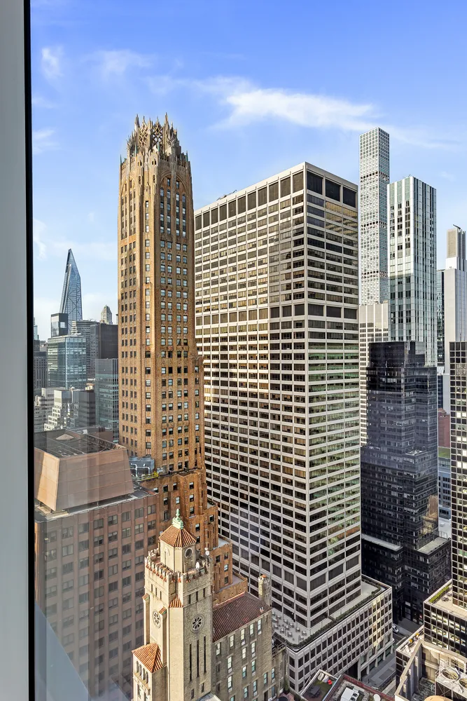 a view of a city with tall buildings