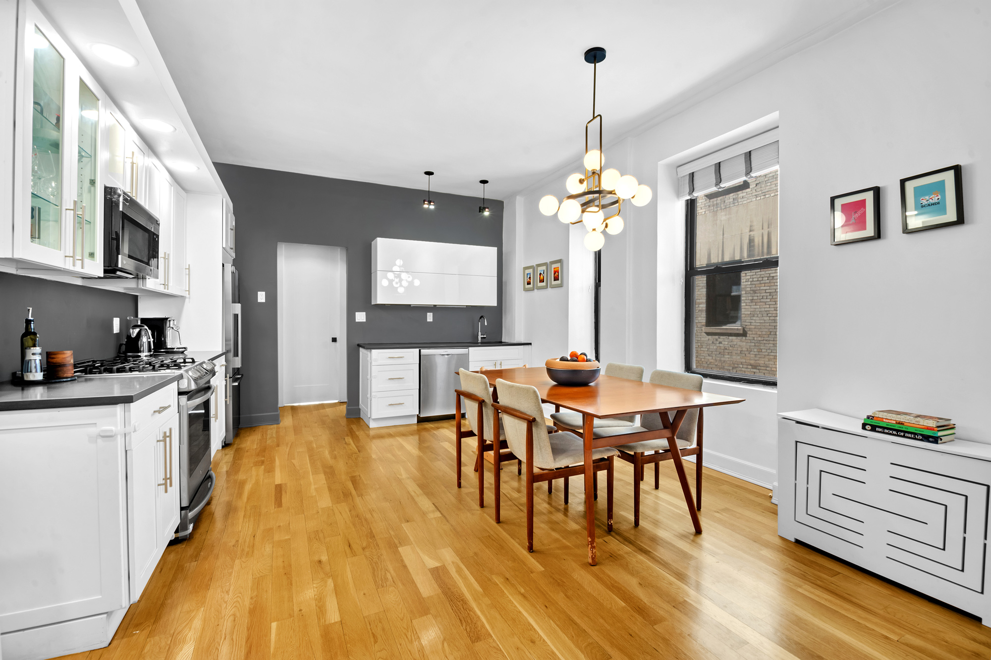 790 Riverside Drive, Unit 2LX Manhattan, NY 10032 - Photo 2 of 10 a view of a dining room with furniture and wooden floor
