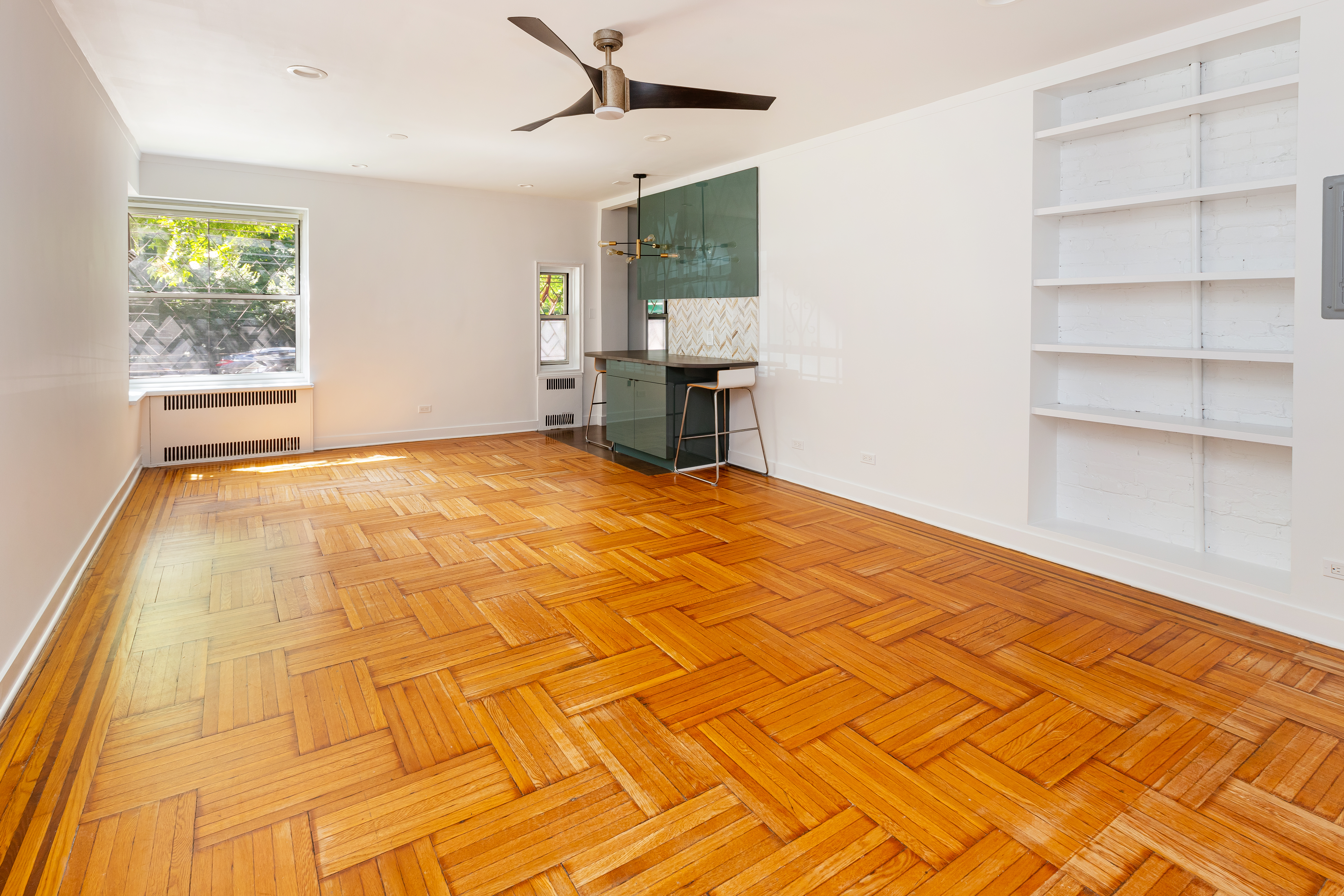 60 Plaza Street East, Unit 1G Brooklyn, NY 11238 - Photo 10 of 13 a view of an empty room with a window