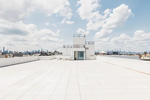 a city view with lot of high rise buildings