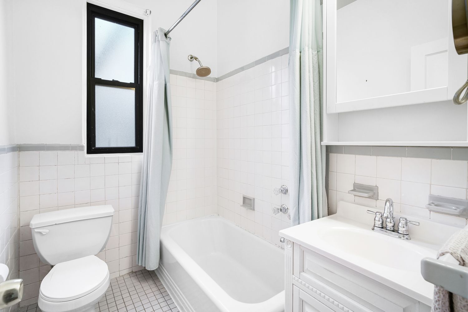 a view of a hallway with seating area