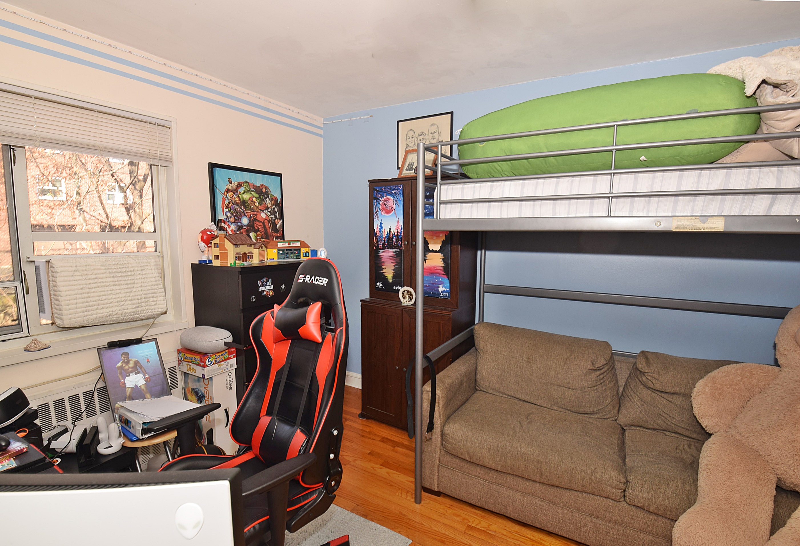 86-59 Springfield Boulevard, Unit U Queens, NY 11427 - Photo 4 of 6 a living room with furniture and a window