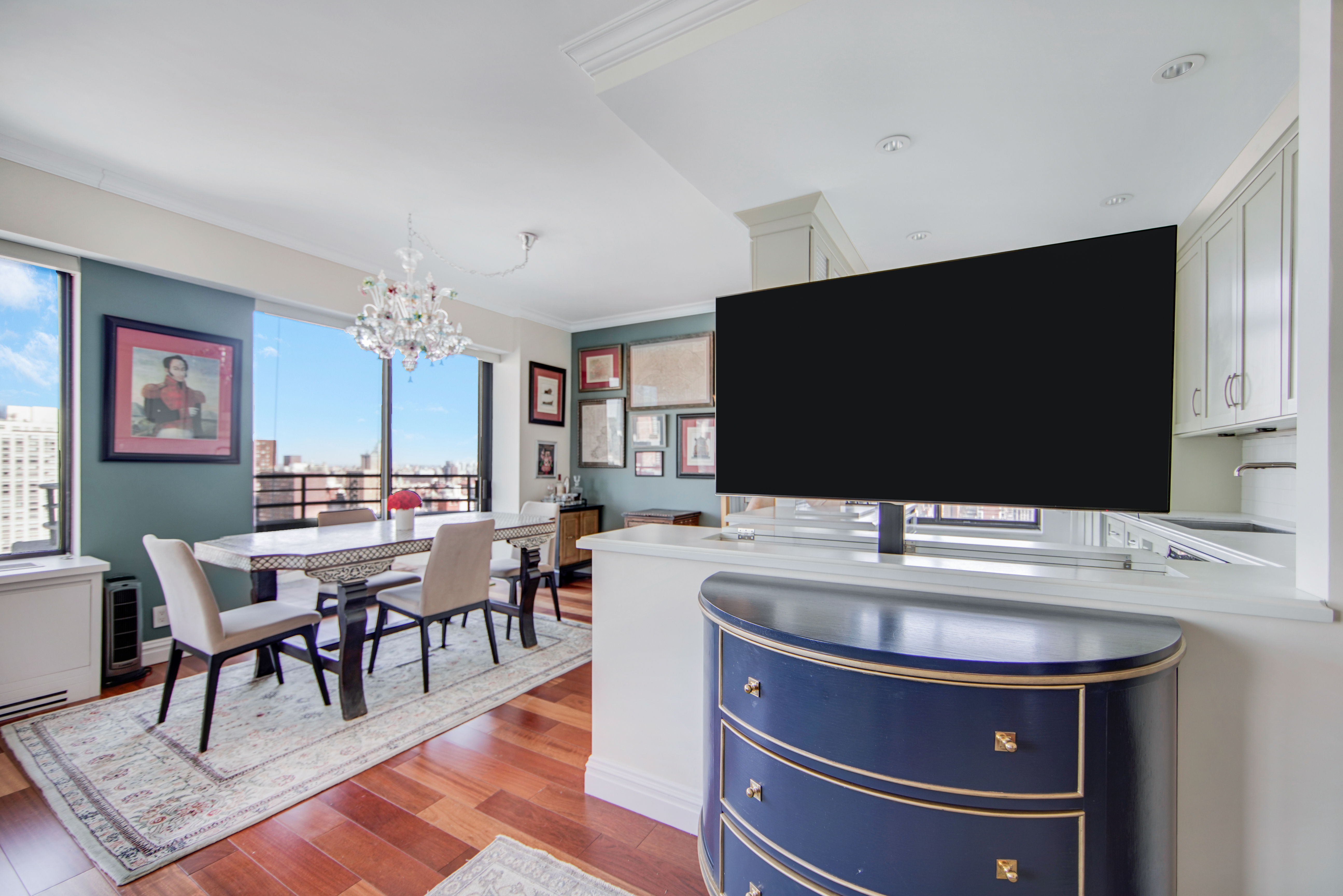 400 East 70th Street, Unit 3301 Manhattan, NY 10021 - Photo 6 of 20 a view of a dining room with furniture