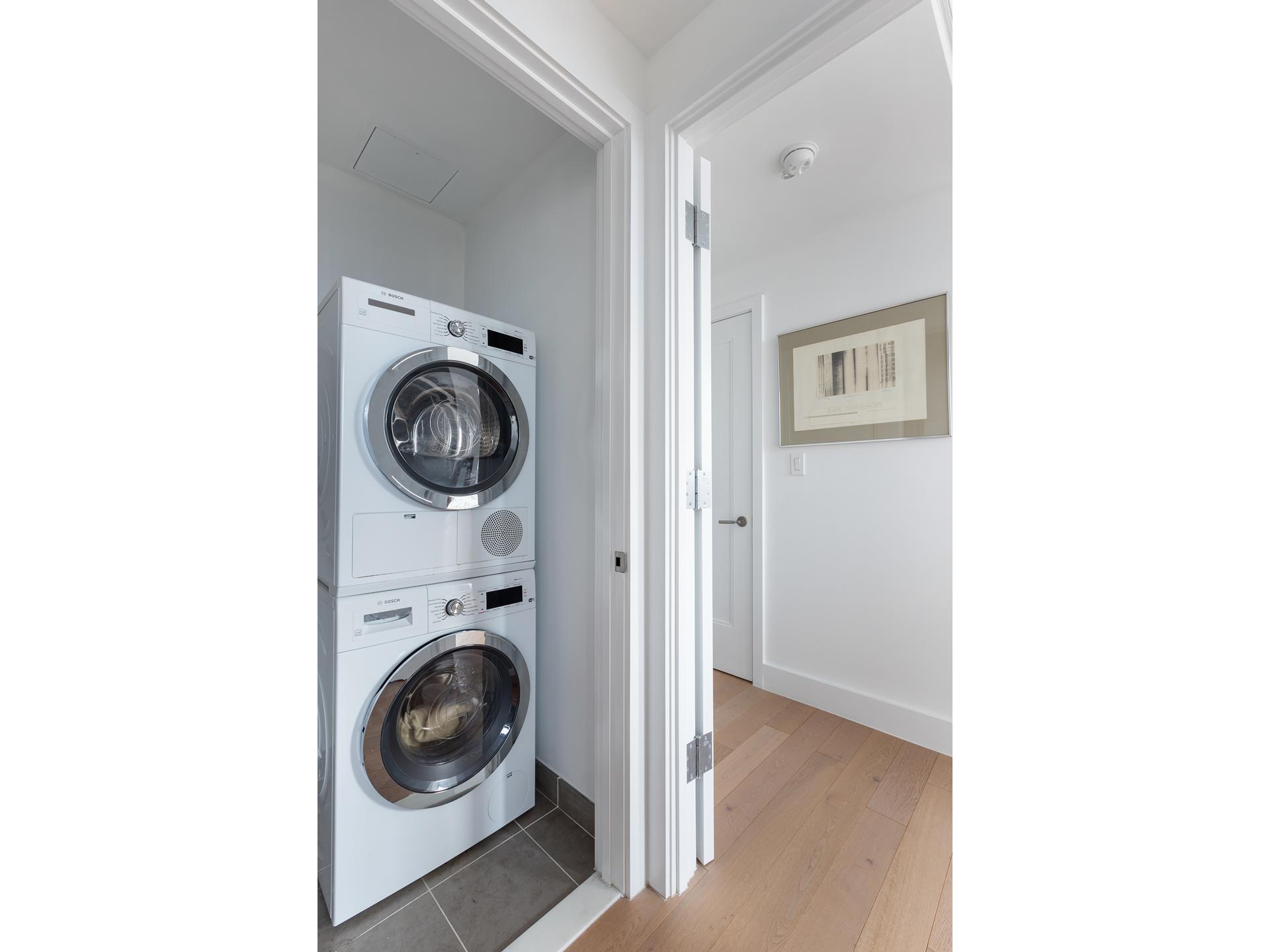 78 Amity Street, Unit 4D Brooklyn, NY 11201 - Photo 9 of 15 a view of a hallway with washer and dryer