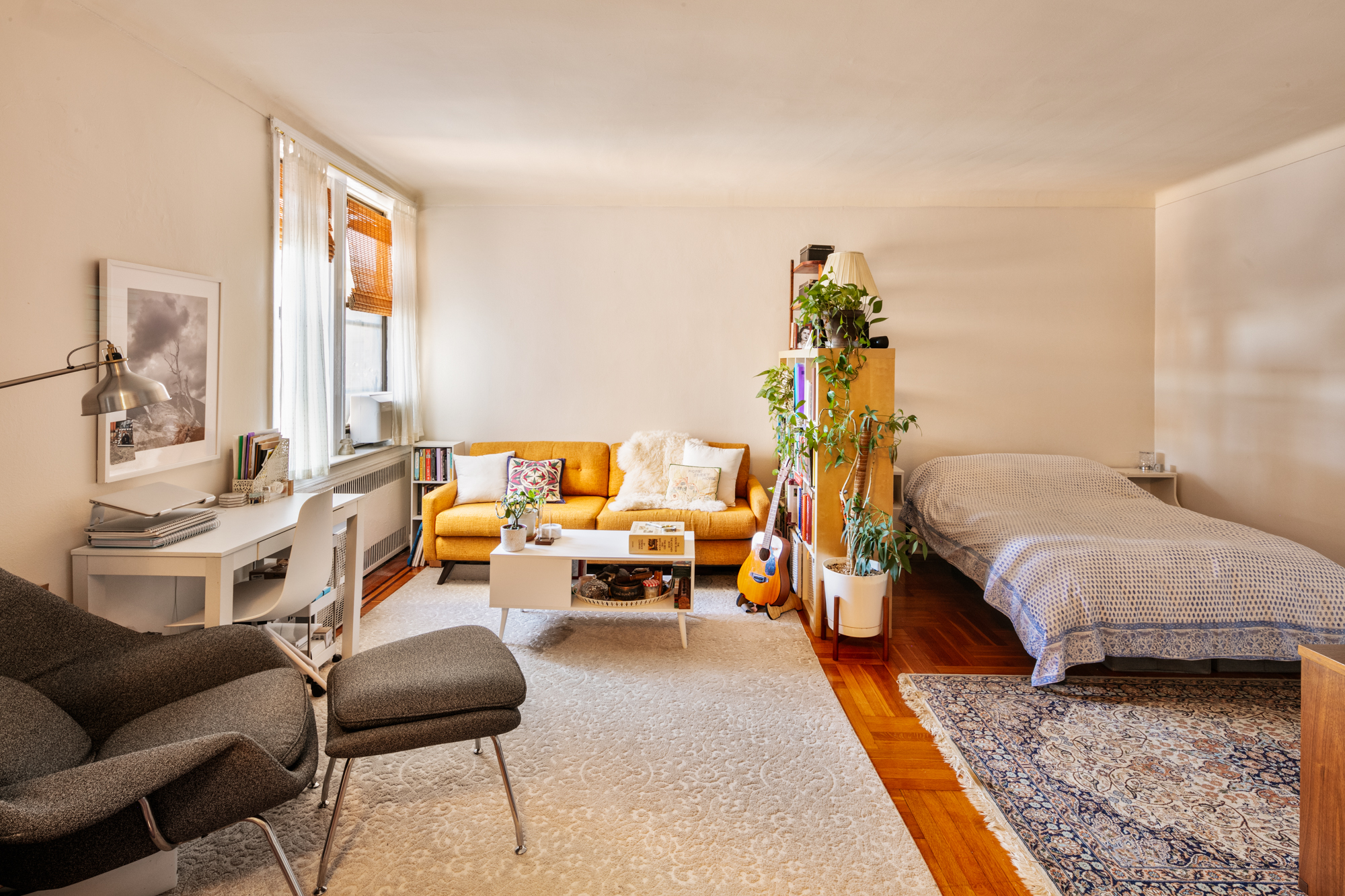 960 Sterling Place, Unit 5K Brooklyn, NY 11213 - Photo 3 of 7 a living room with furniture wooden floor and a rug