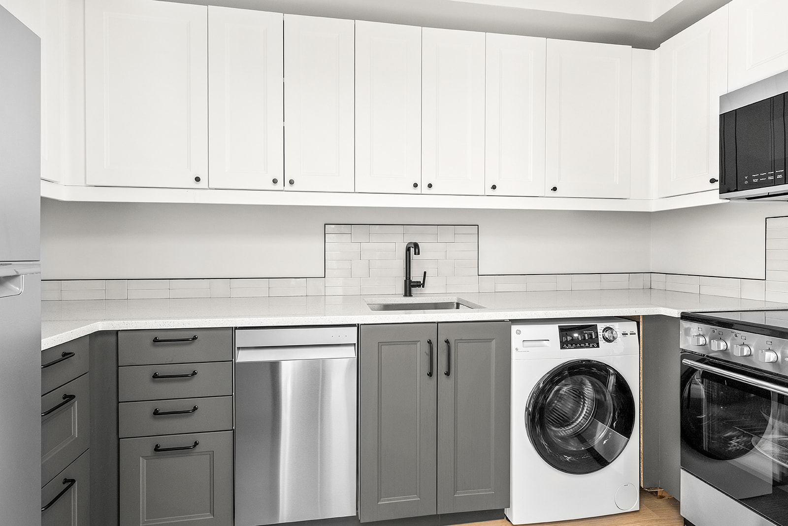 155 14th Street, Unit B Brooklyn, NY 11215 - Photo 2 of 6 a utility room with sink dryer and washer
