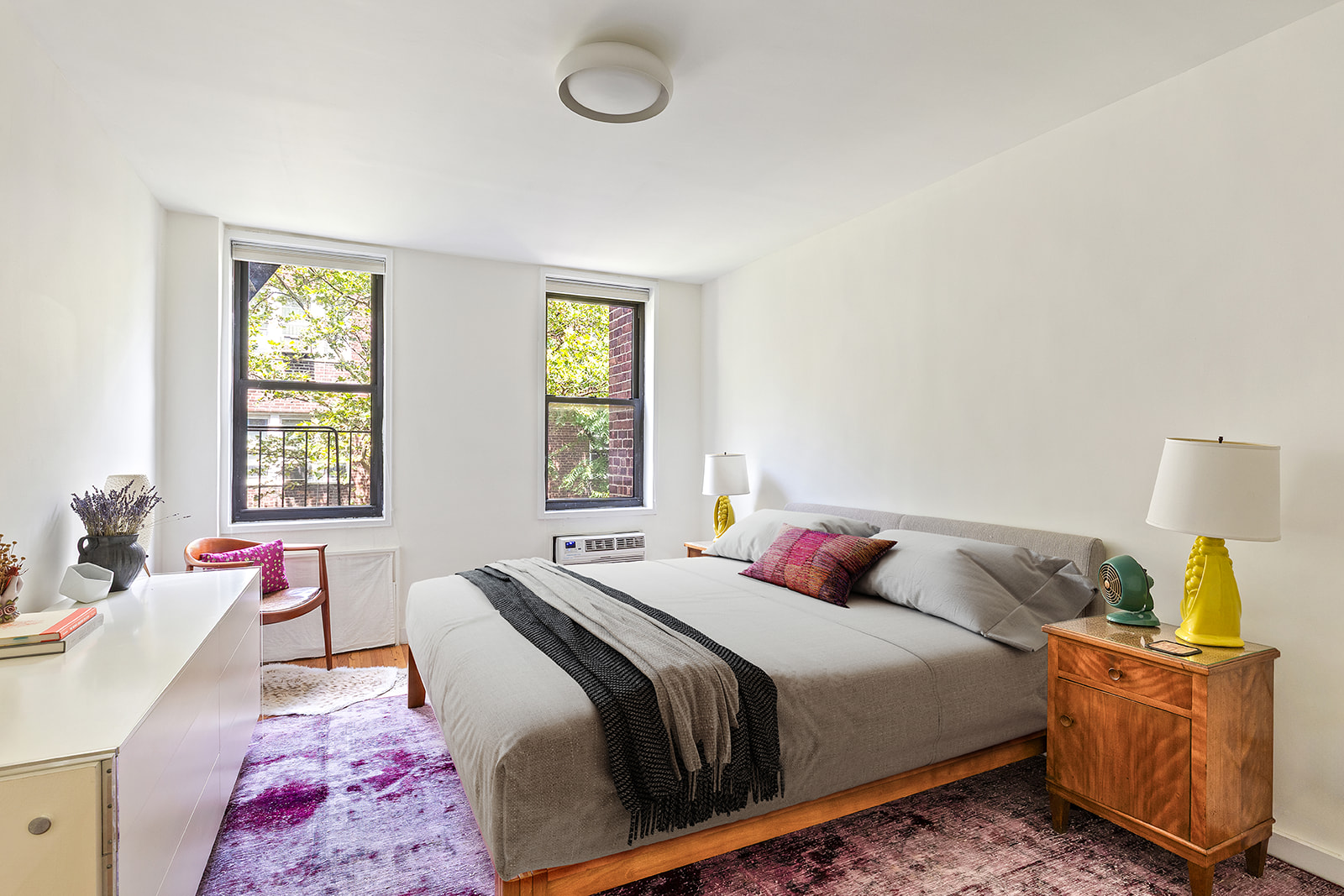 275 Webster Avenue, Unit 5I Brooklyn, NY 11230 - Photo 5 of 7 a bedroom with a bed and window